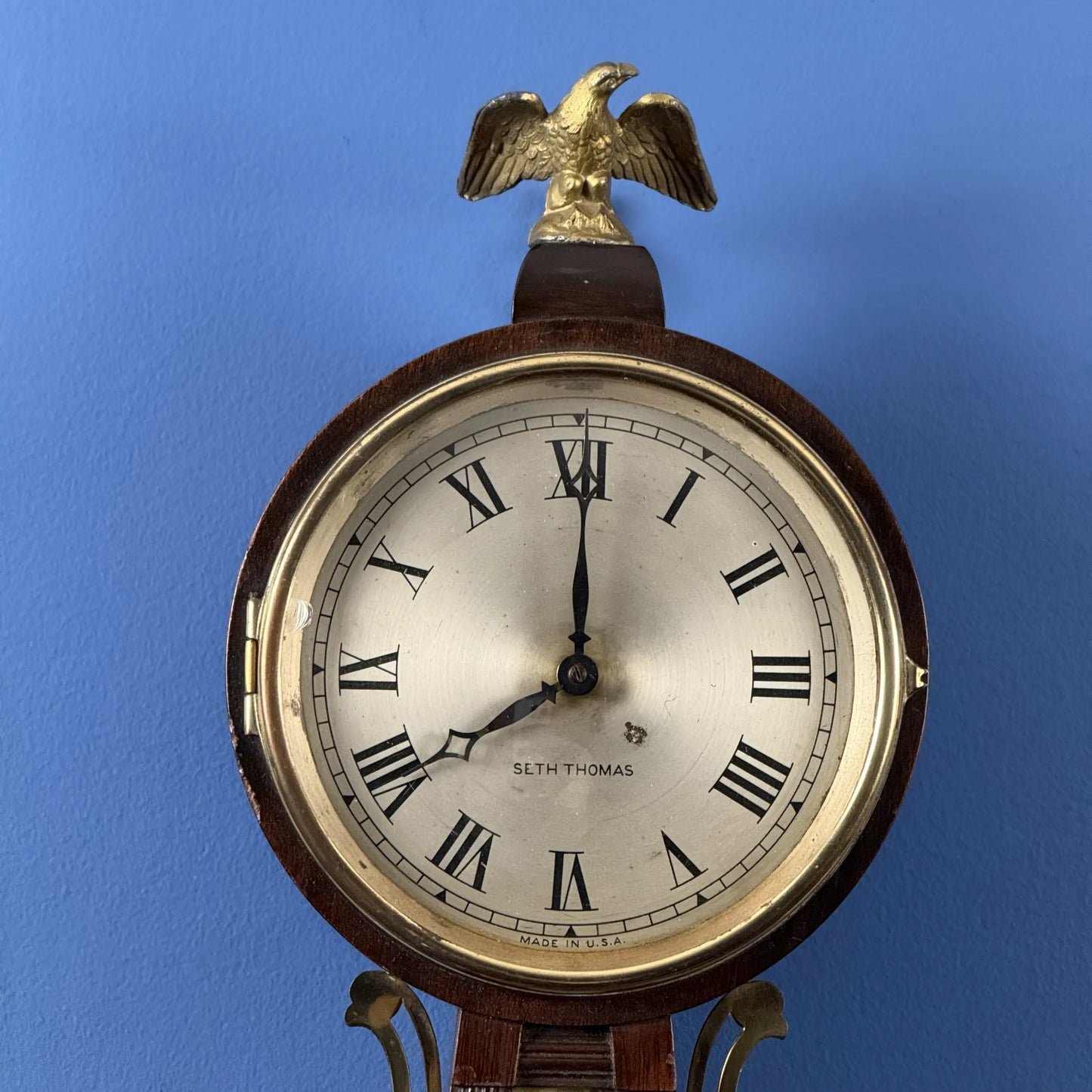 Seth Thomas "Banjo Clock" showing the Boston Tea Party — Electric (possibly)