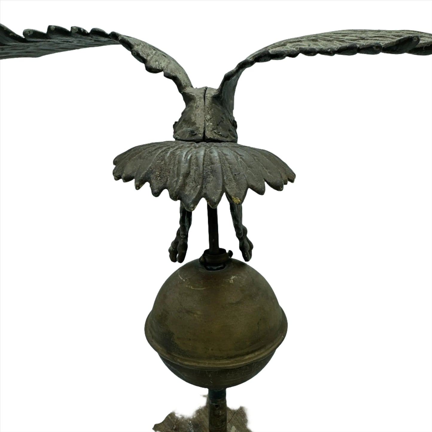 Mounted metal eagle atop a ball and wooden base