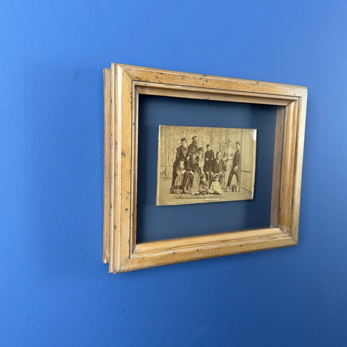 Photograph of Grant and his family on their porch shortly before his death — Framed