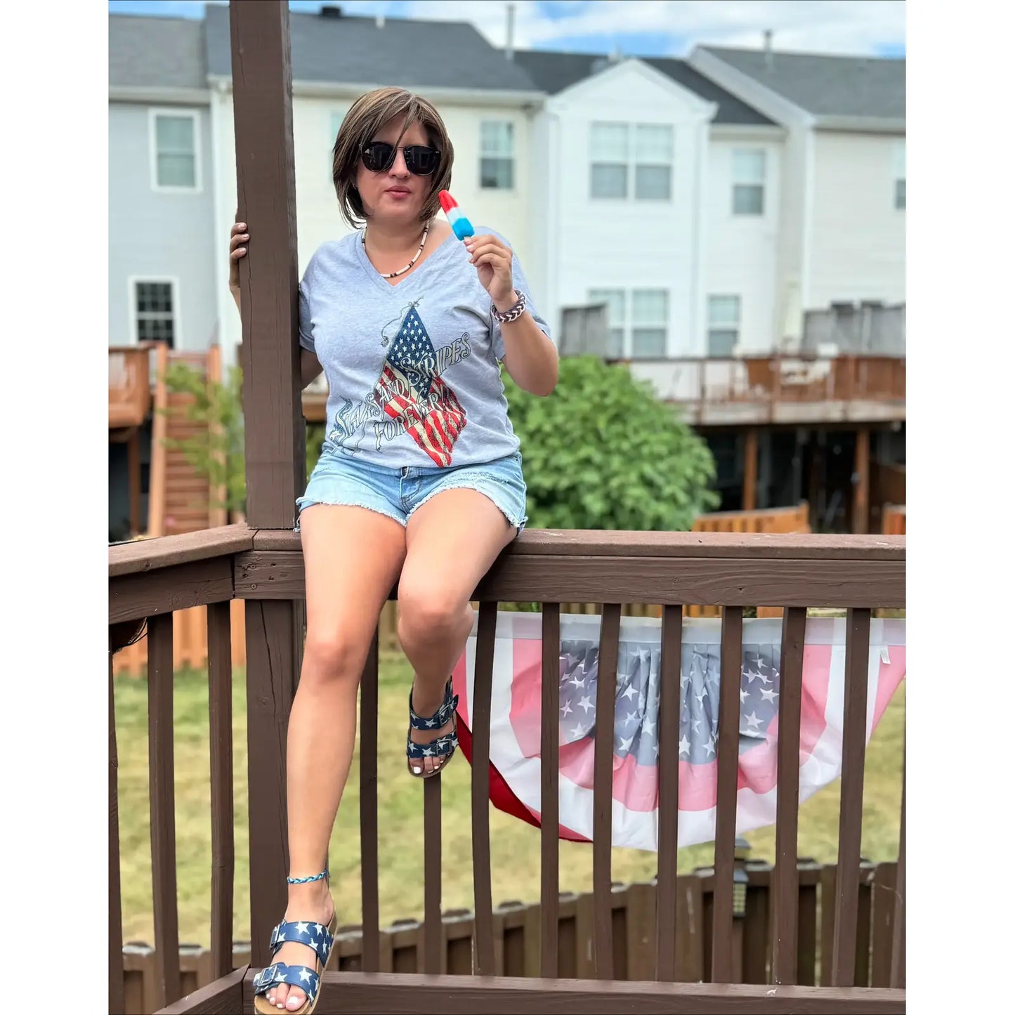 Larisa's photo wearing the "Stars and Stripes Forever" women's V-neck shirt from The History List Store.