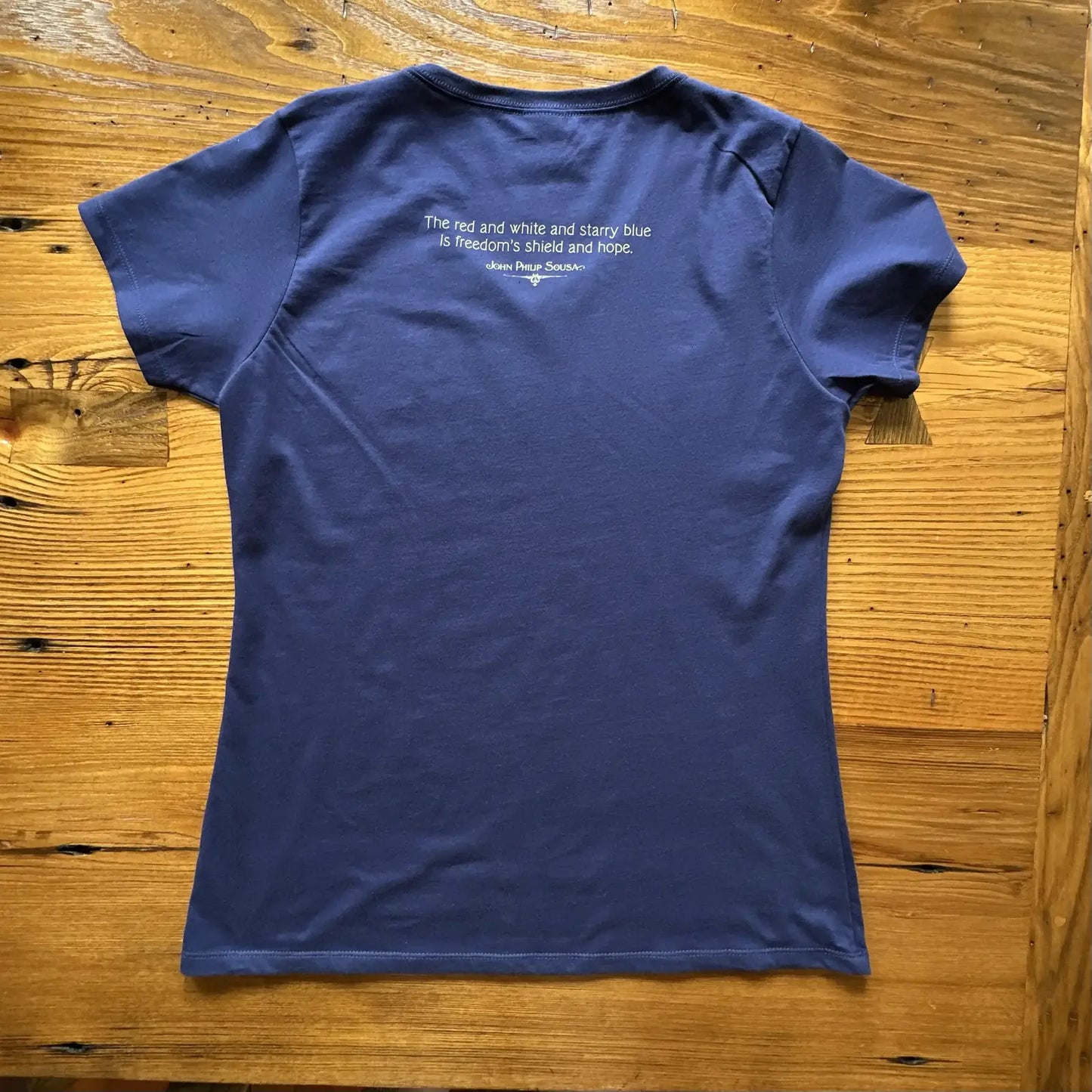 Back view of the "Stars and Stripes Forever" women's V-neck shirt from The History List Store.