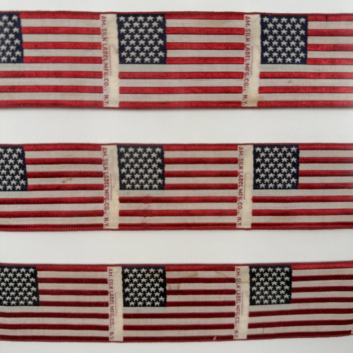 Close-up view of the 1876 American Centennial Silk Flags — Framed from The History List store