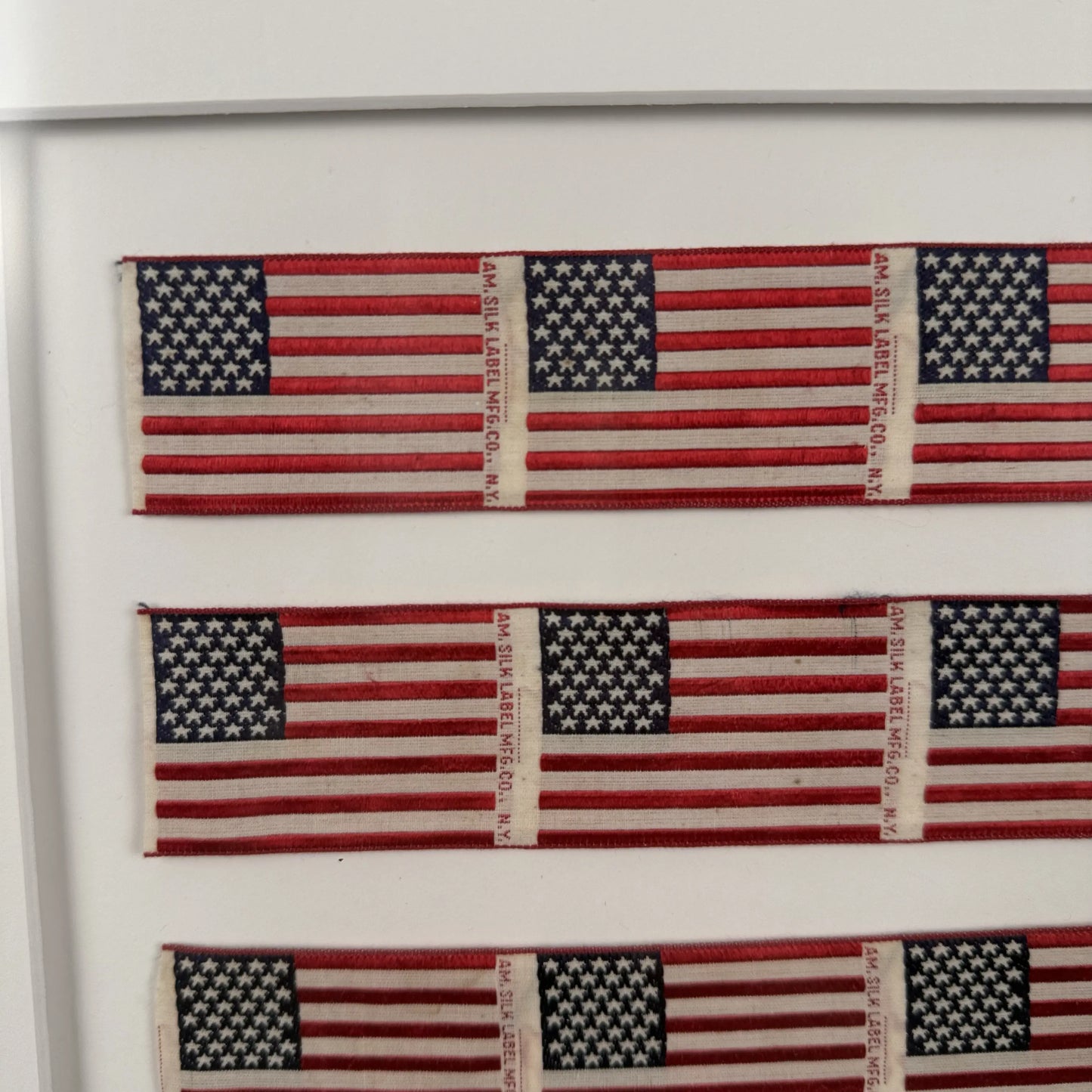 Close-up of 1876 American Centennial Silk Flags — Framed from The History List store