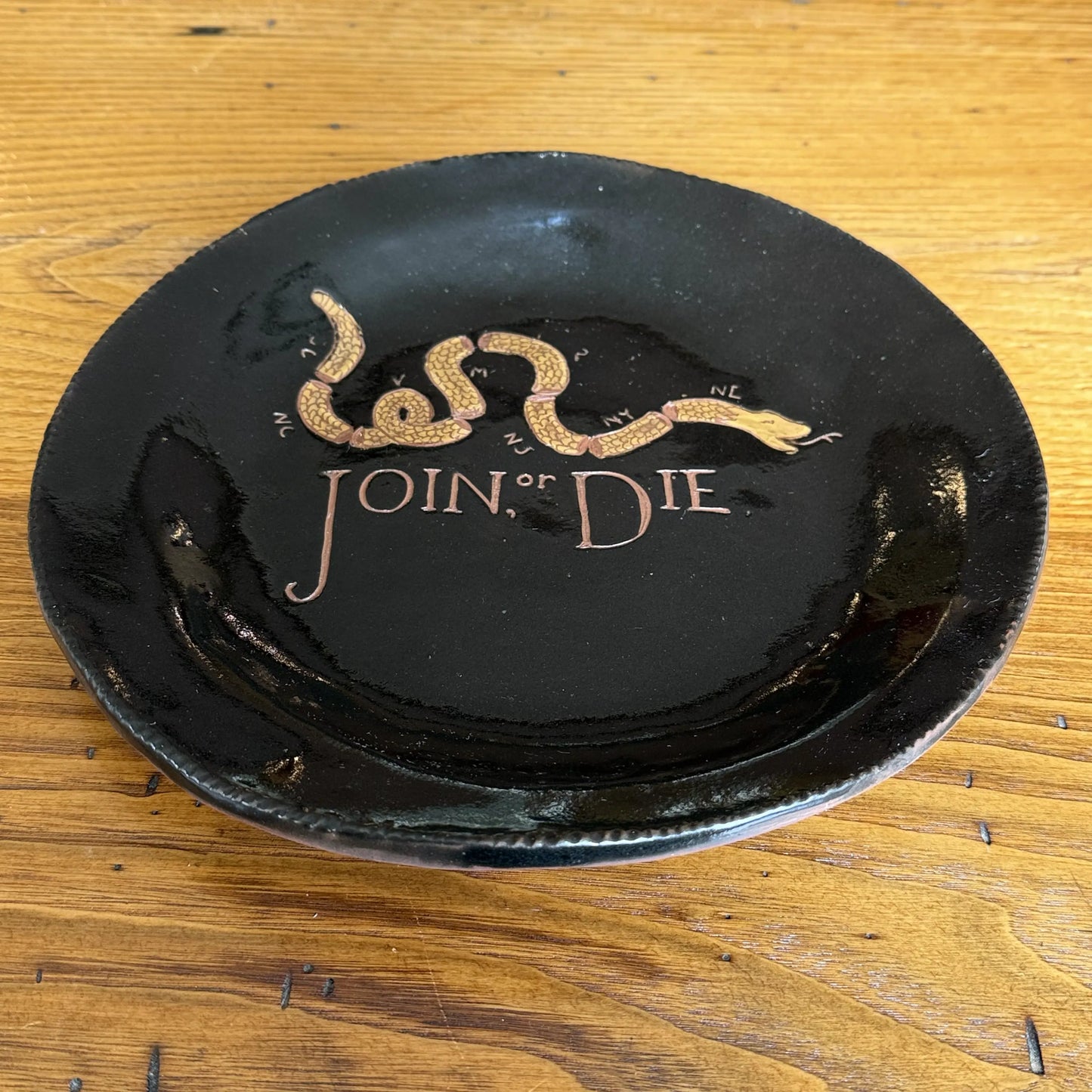 "Join or Die" Plate — Traditional redware made by hand in America from The History List store — Angled