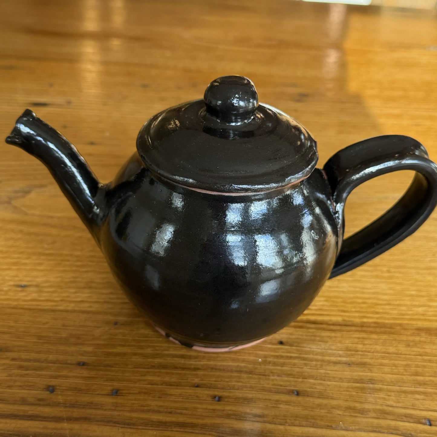 "Join or Die" Teapot — Traditional redware made by hand in America from The History List store Blank side