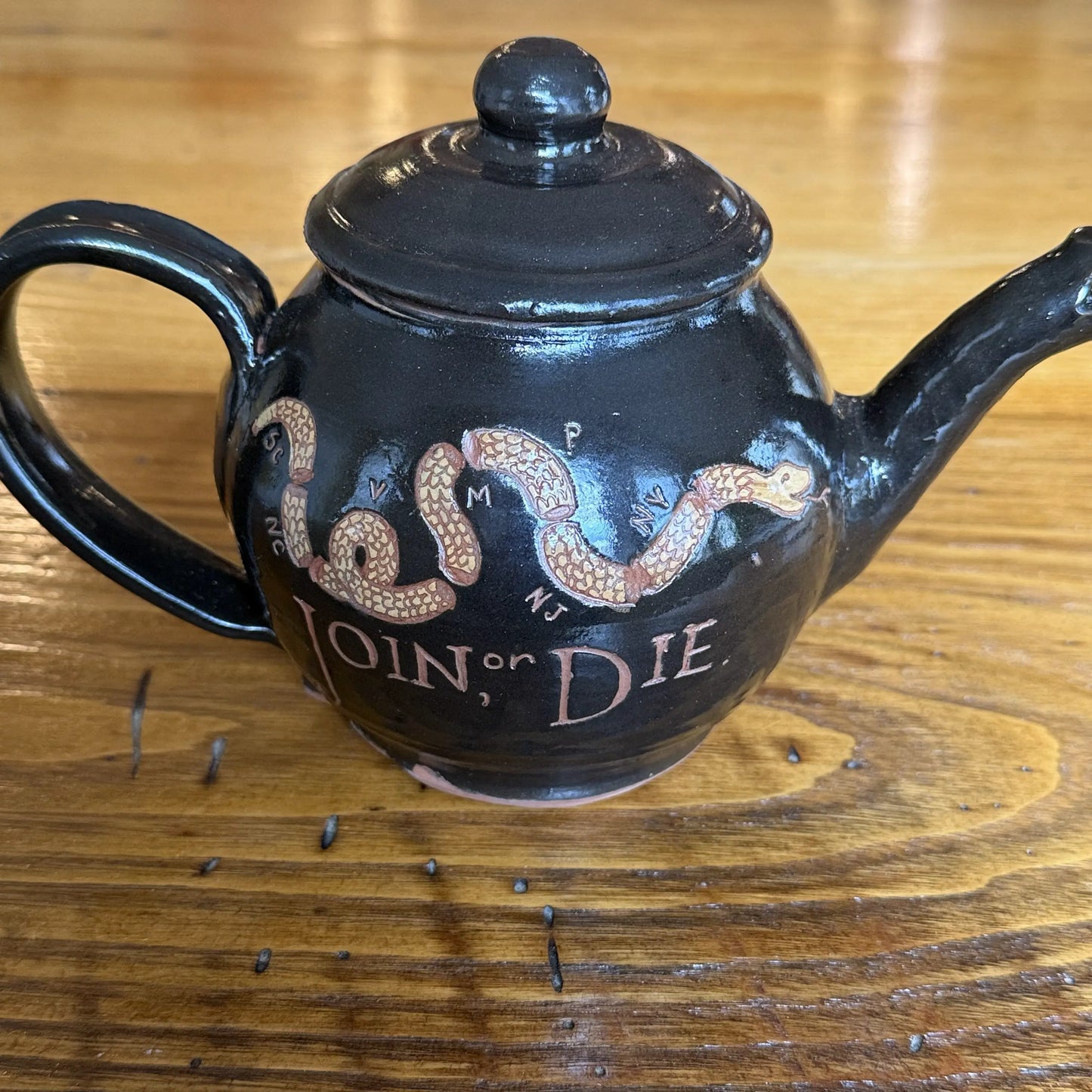 "Join or Die" Teapot — Traditional redware made by hand in America from The History List store
