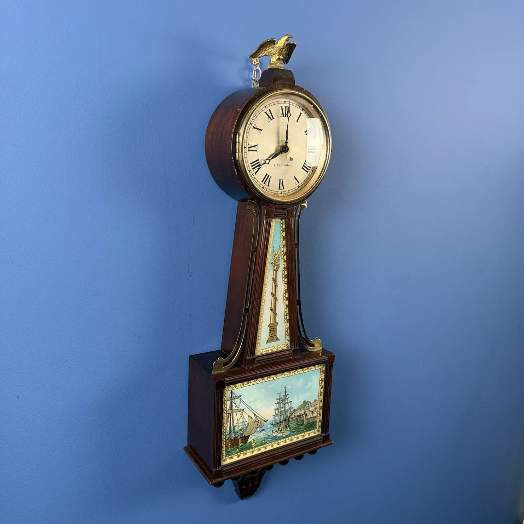 Seth Thomas "Banjo Clock" showing the Boston Tea Party — Electric (possibly)