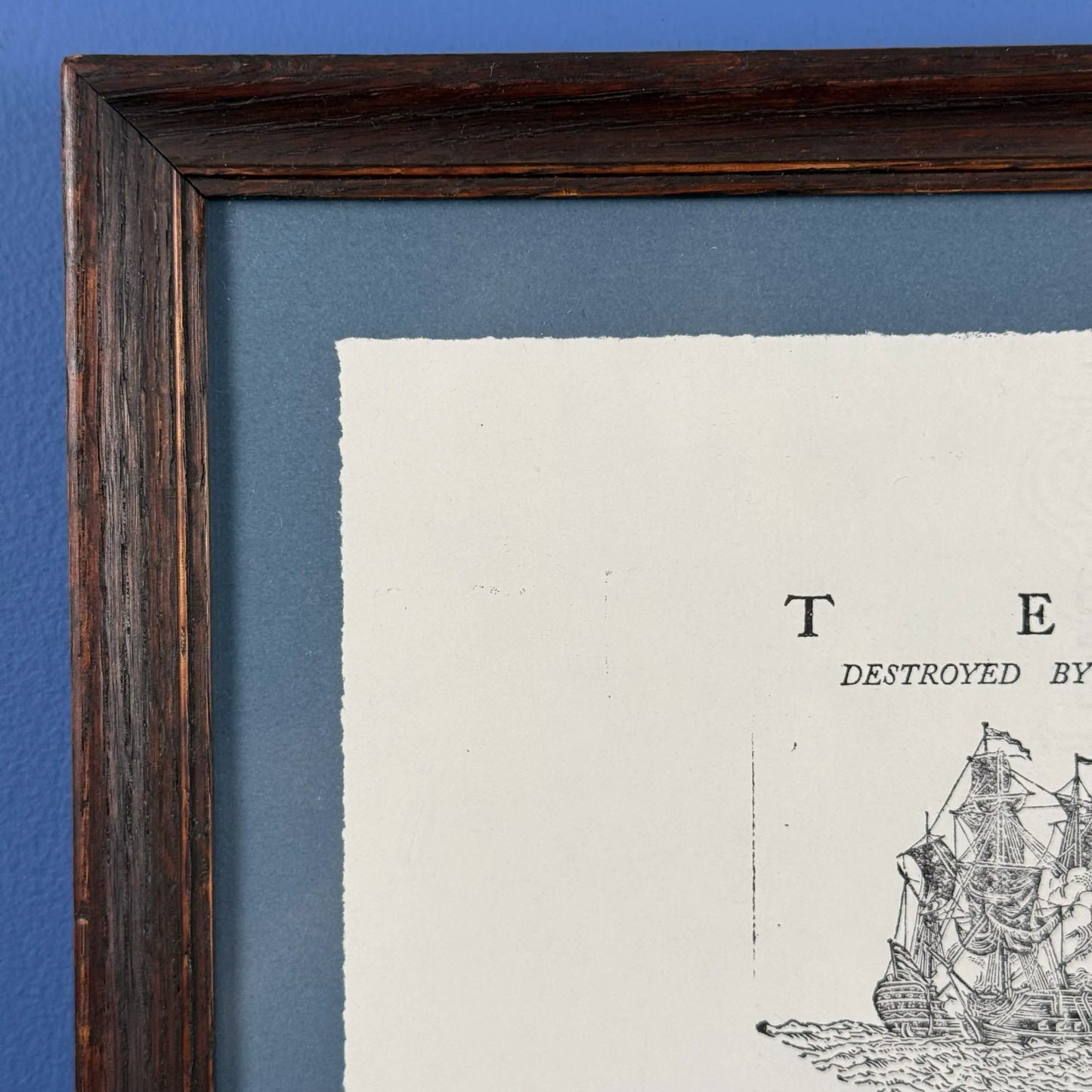 Framed "Tea Destroyed by Indians" reproduction print in an antique frame