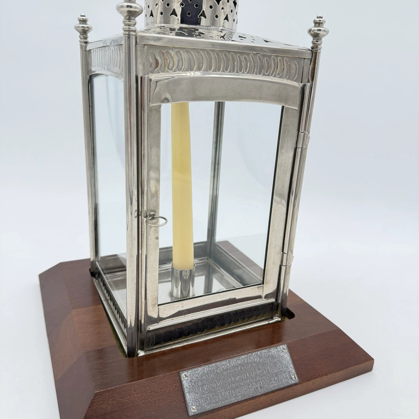 Close-up photo with Candle of "The Original Bicentennial Paul Revere ~ North Church Lantern — Numbered — Authorized by the Concord Antiquarian Society" from The History List Store.