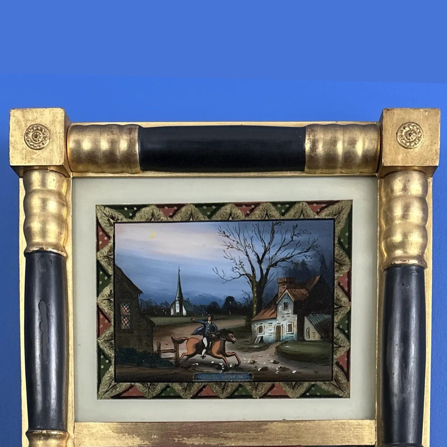Reverse-painted Federal mirror with Paul Revere