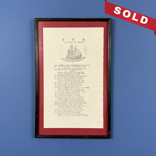 Framed "Tea Destroyed by Indians" reproduction print in an antique frame