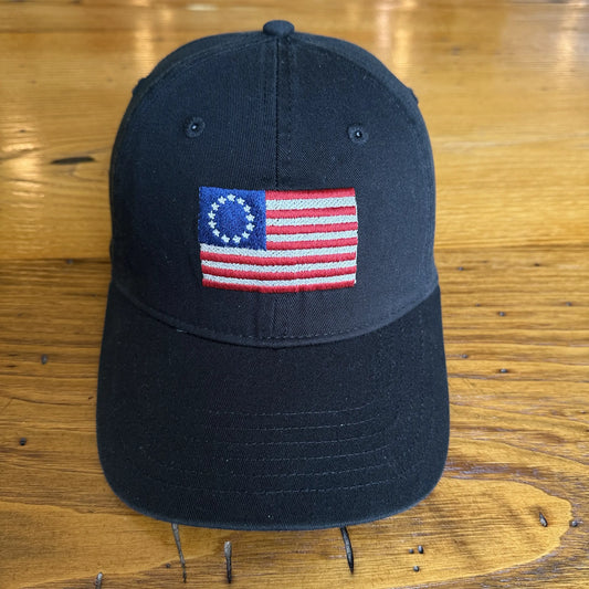Front view of the Embroidered "Betsy Ross Flag — July 4, 1776" cap — Black from The History List Store.