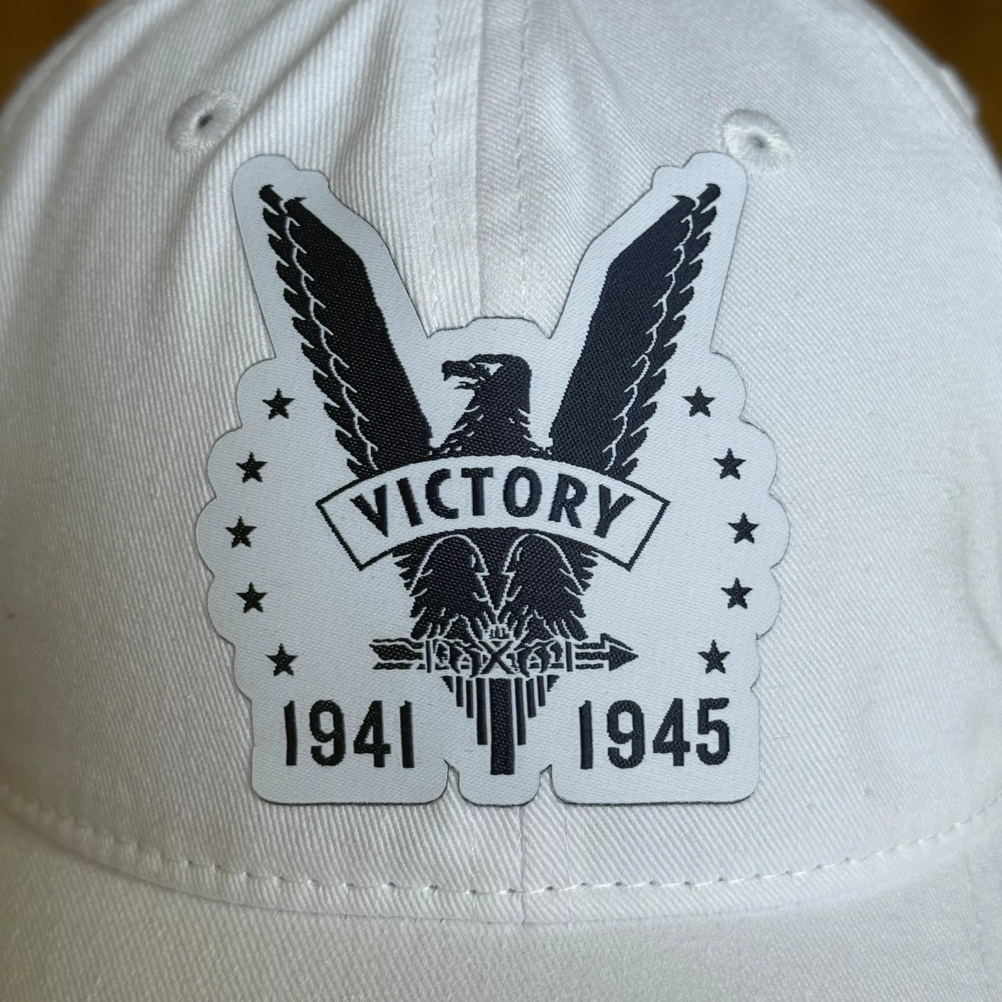Close-up of white WWII Victory 80th Anniversary Cap from The History List store