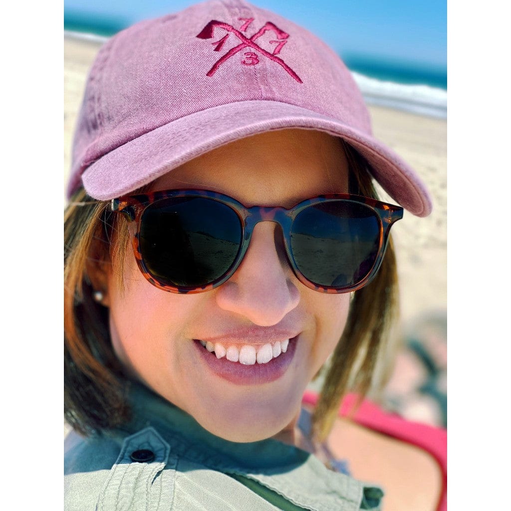 Larisa wearing the Embroidered "1773" Boston Tea Party cap - For hardcore history folks - Maroon from the History List Store