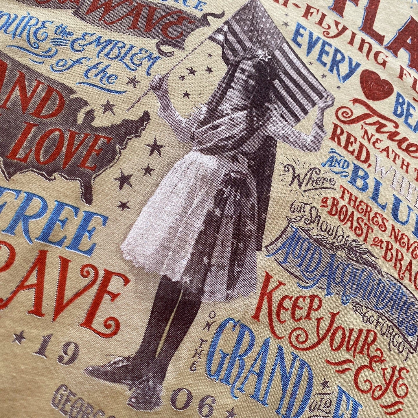 Closeup "Grand Old Flag" Shirt Sand color back design from the history list store