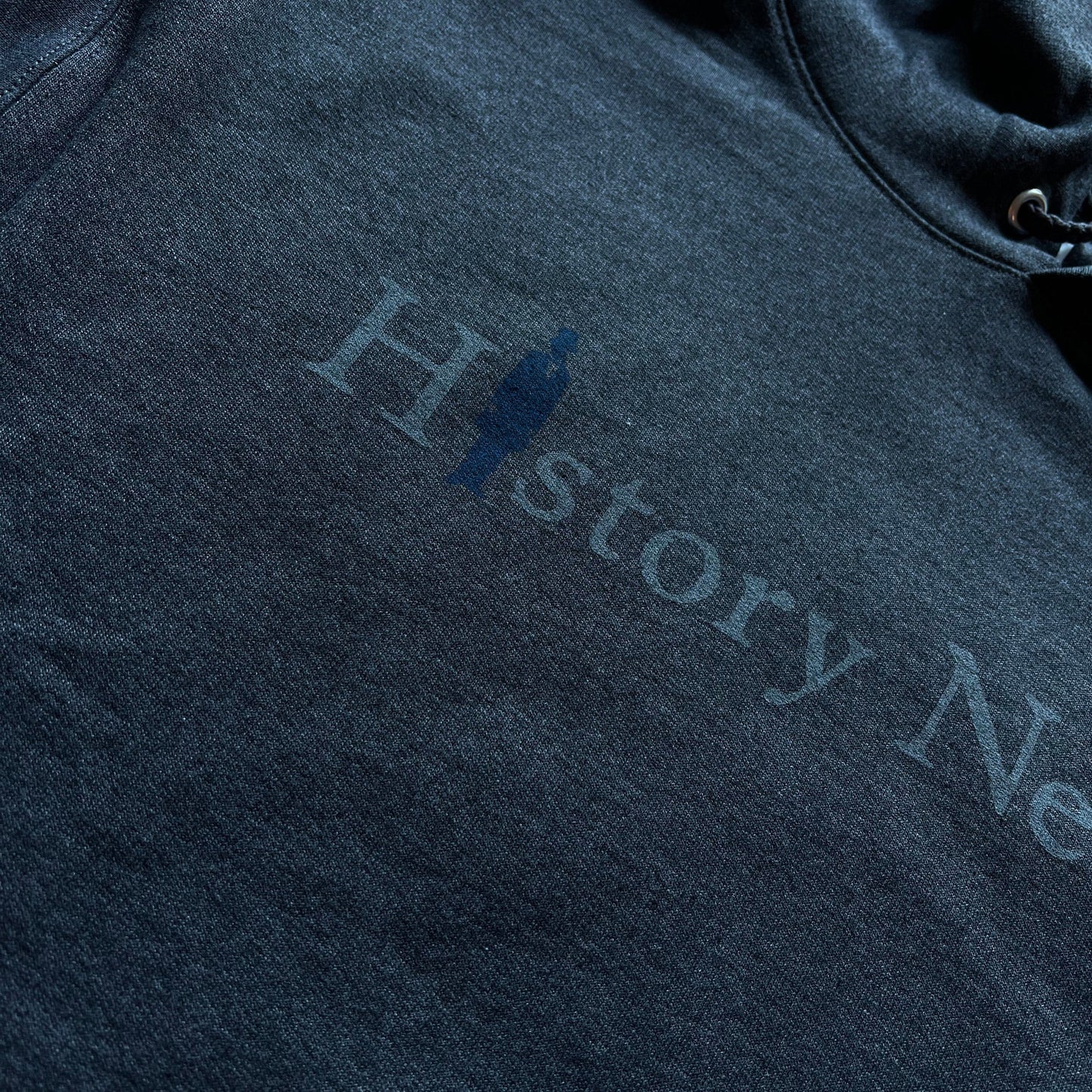 Close-up of "History Nerd" with Abraham Lincoln - Hooded sweatshirt in Charcoal heather from The History List store