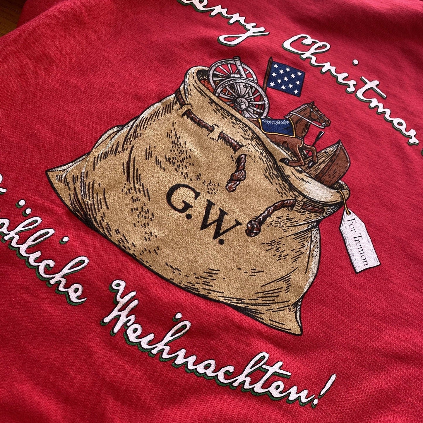 Back view close-up of the George Washington's Christmas Day Crossing of the Delaware Pullover sweatshirt — The Christmas hoodie for history nerds from The History List Store.