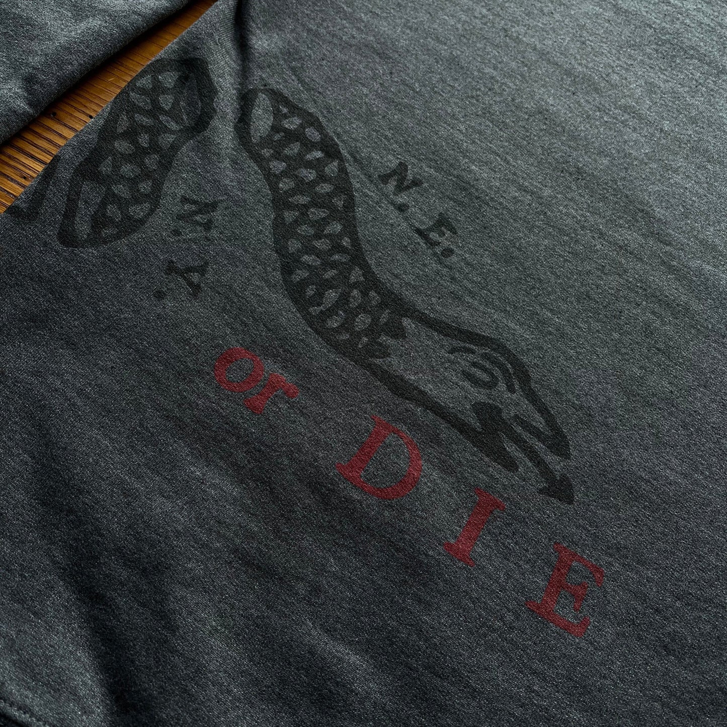 Close-up of Back of "Join or Die" Crewneck sweatshirt from the Light-Blue George Washington from The History List Store.