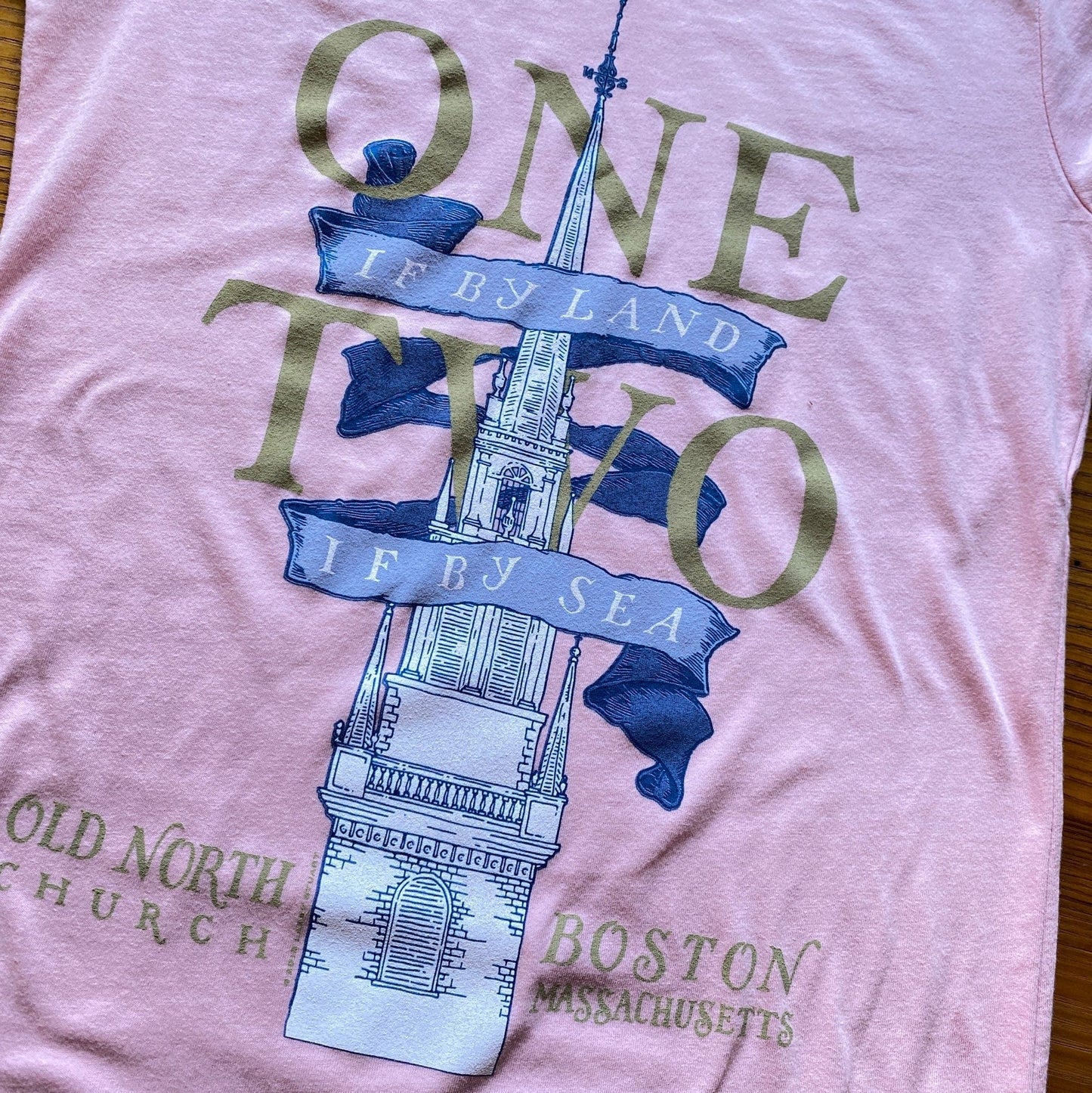 Close-up of Pink "One if by land . . ." Old North Special Edition T-shirt in Youth sizes from the history list store