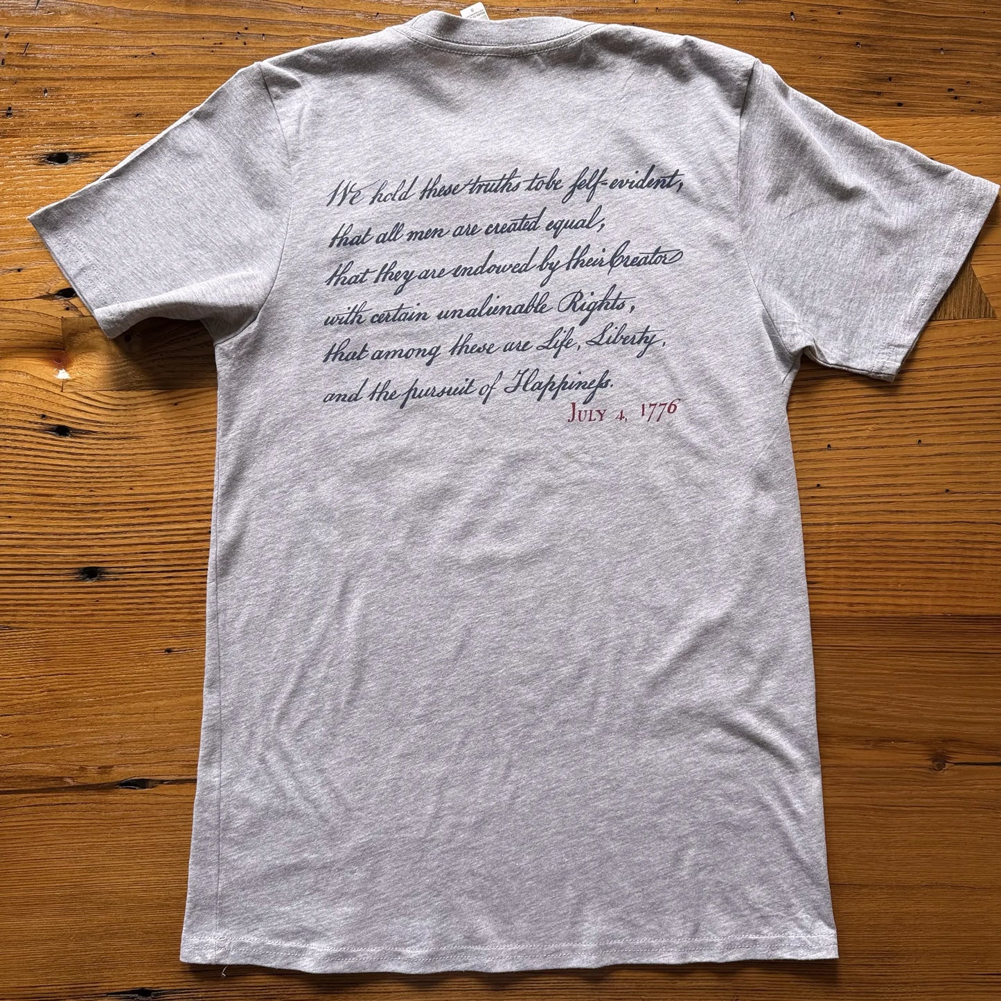 Back view of the "We hold these truths - July 4, 1776" T-shirt in Light Gray, from The History List Store.