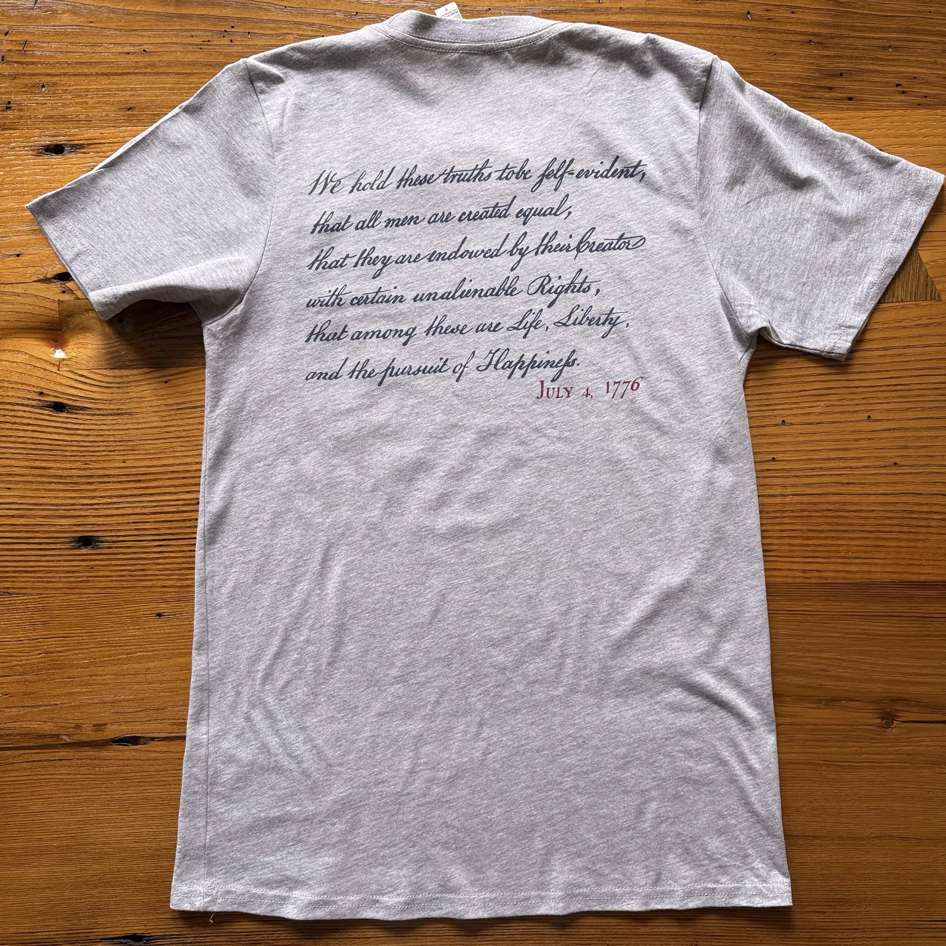 Back view of the "We hold these truths - July 4, 1776" T-shirt in Light Gray, from The History List Store.