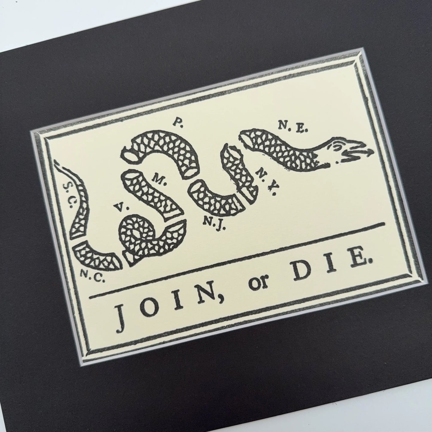 "Join or Die" Framed print of 1754 political cartoon created by Benjamin Franklin published in the Pennsylvania Gazette