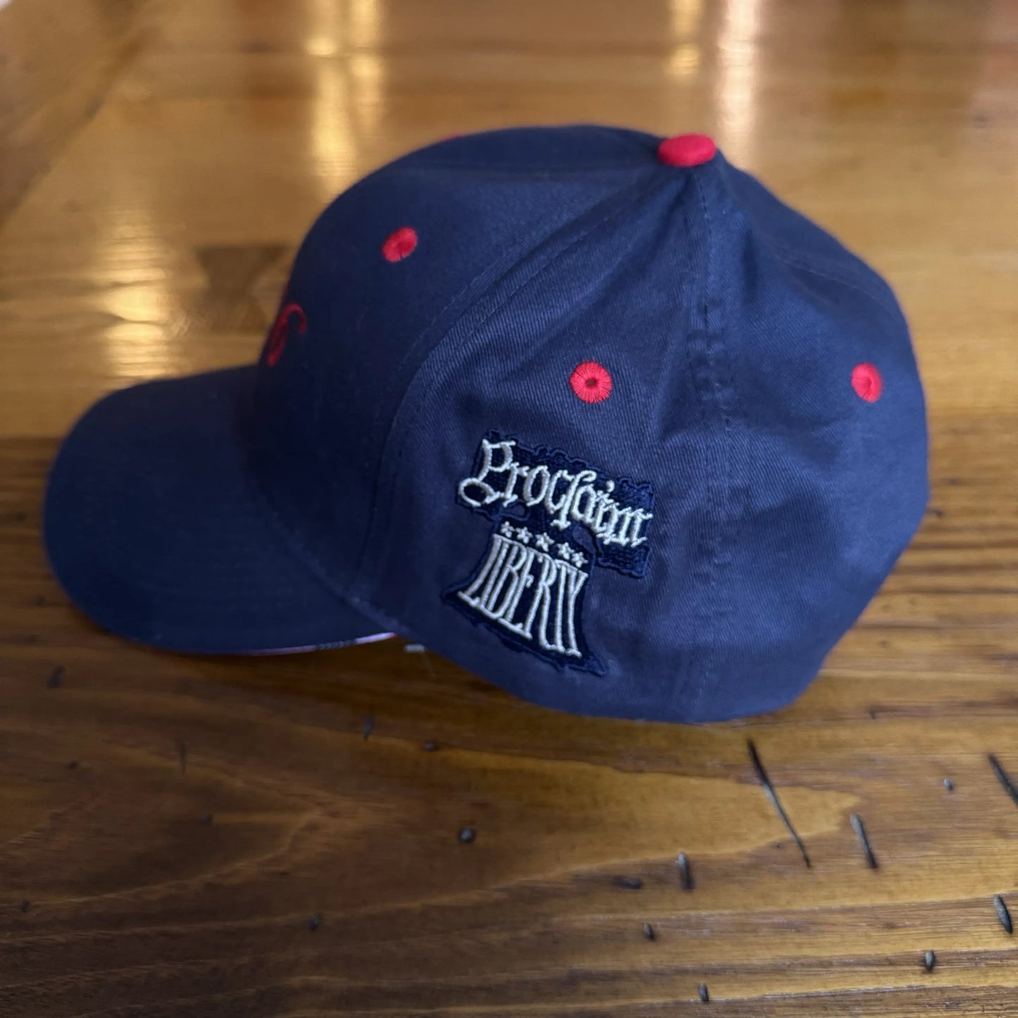 Embroidered "1776" cap with Proclaim Liberty — Dark blue with flag brim