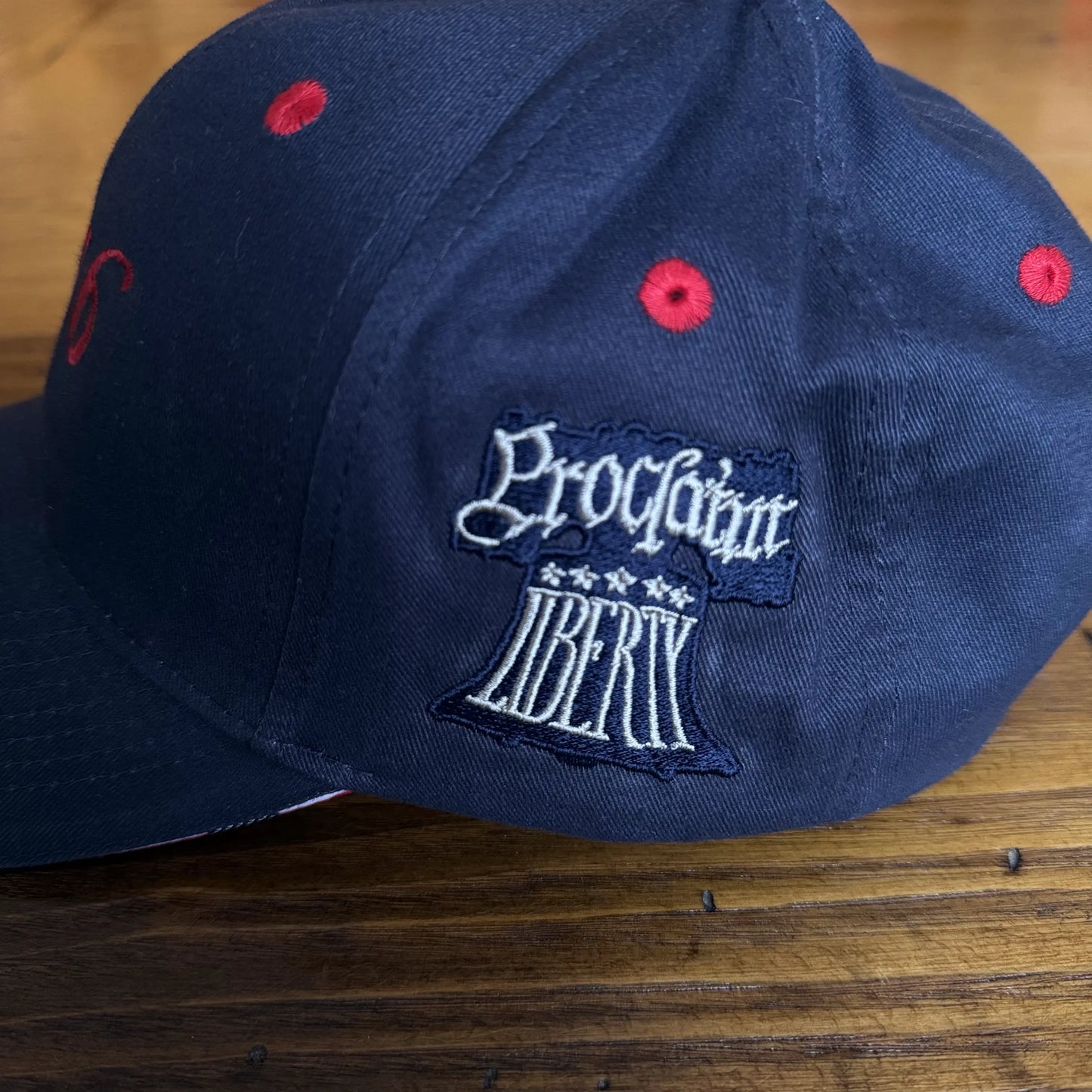 Embroidered "1776" cap with Proclaim Liberty — Dark blue with flag brim