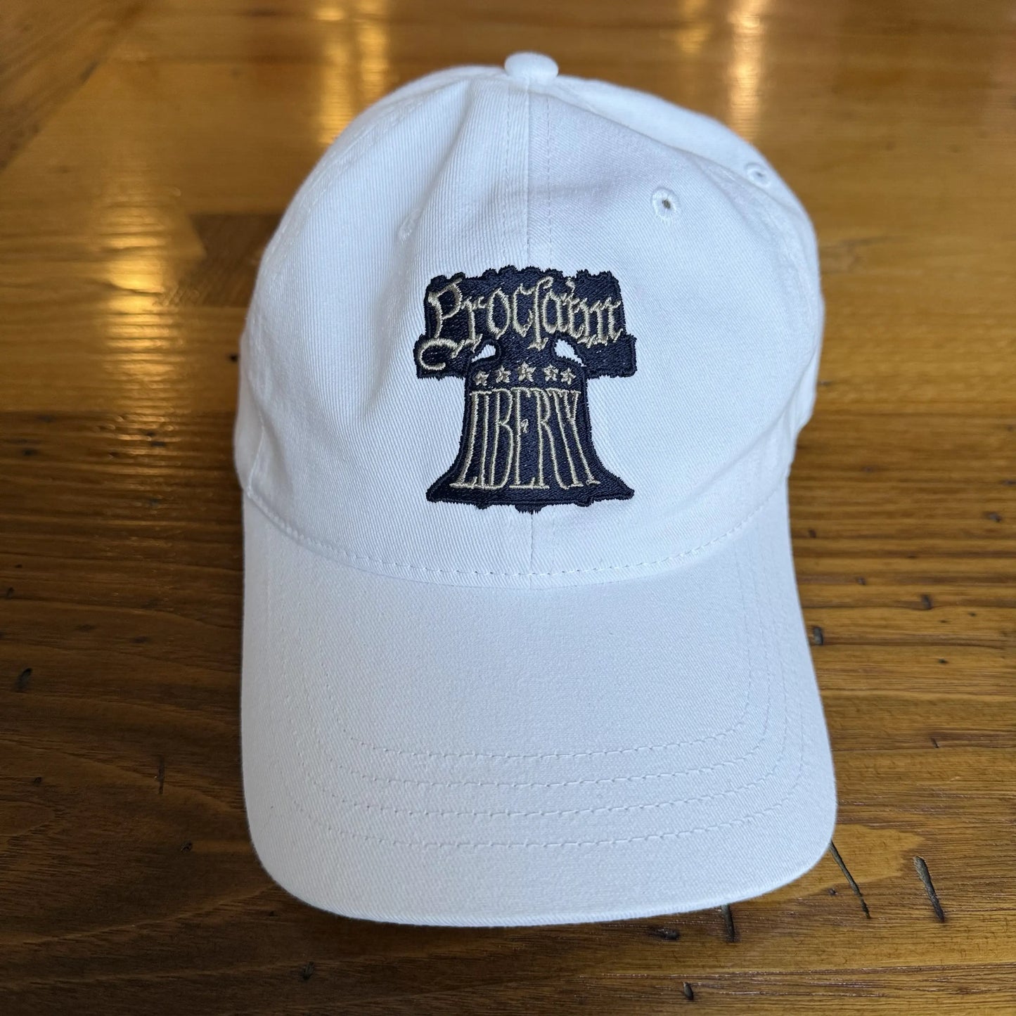 Embroidered "Proclaim Liberty" cap with the Liberty Bell — White