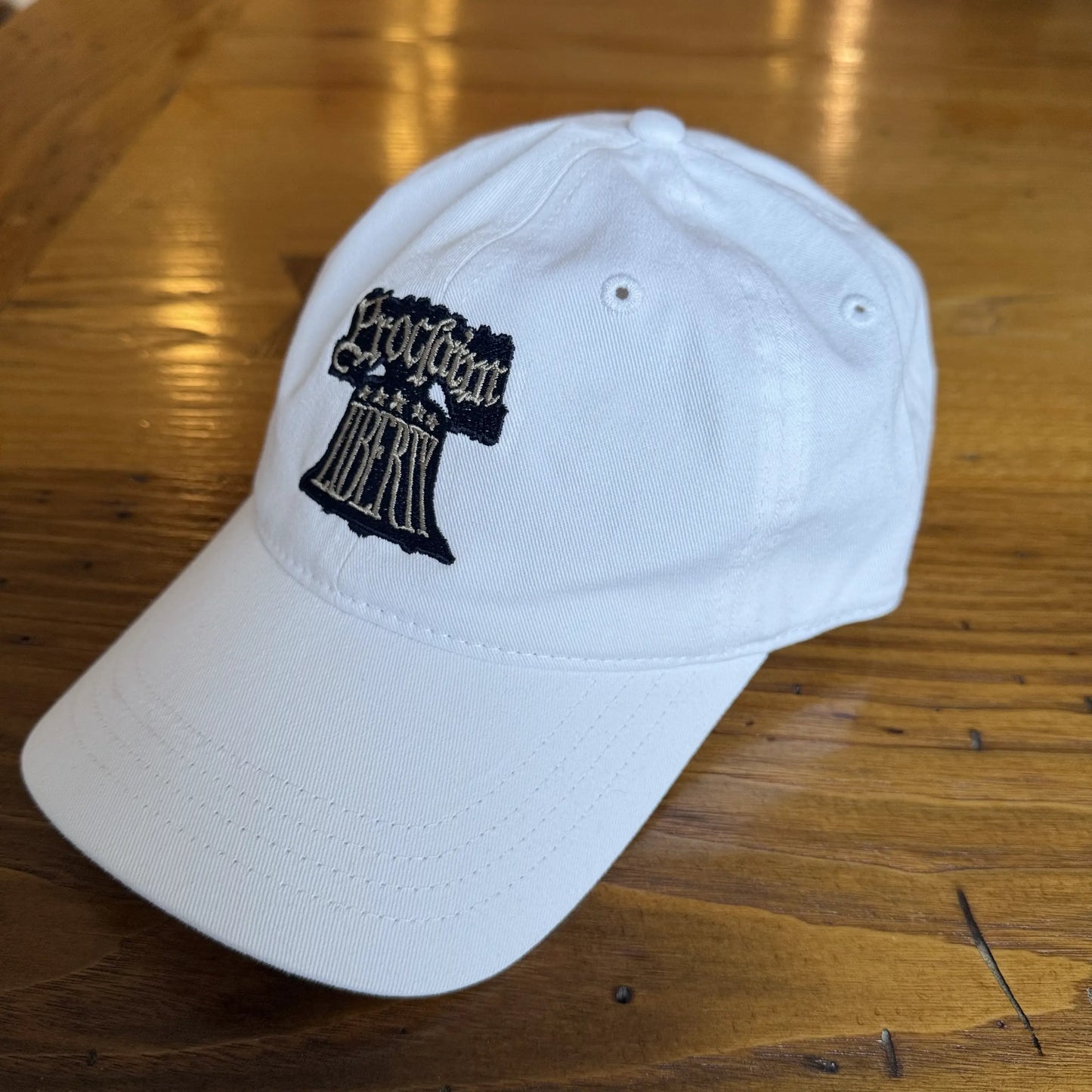 Embroidered "Proclaim Liberty" cap with the Liberty Bell — White