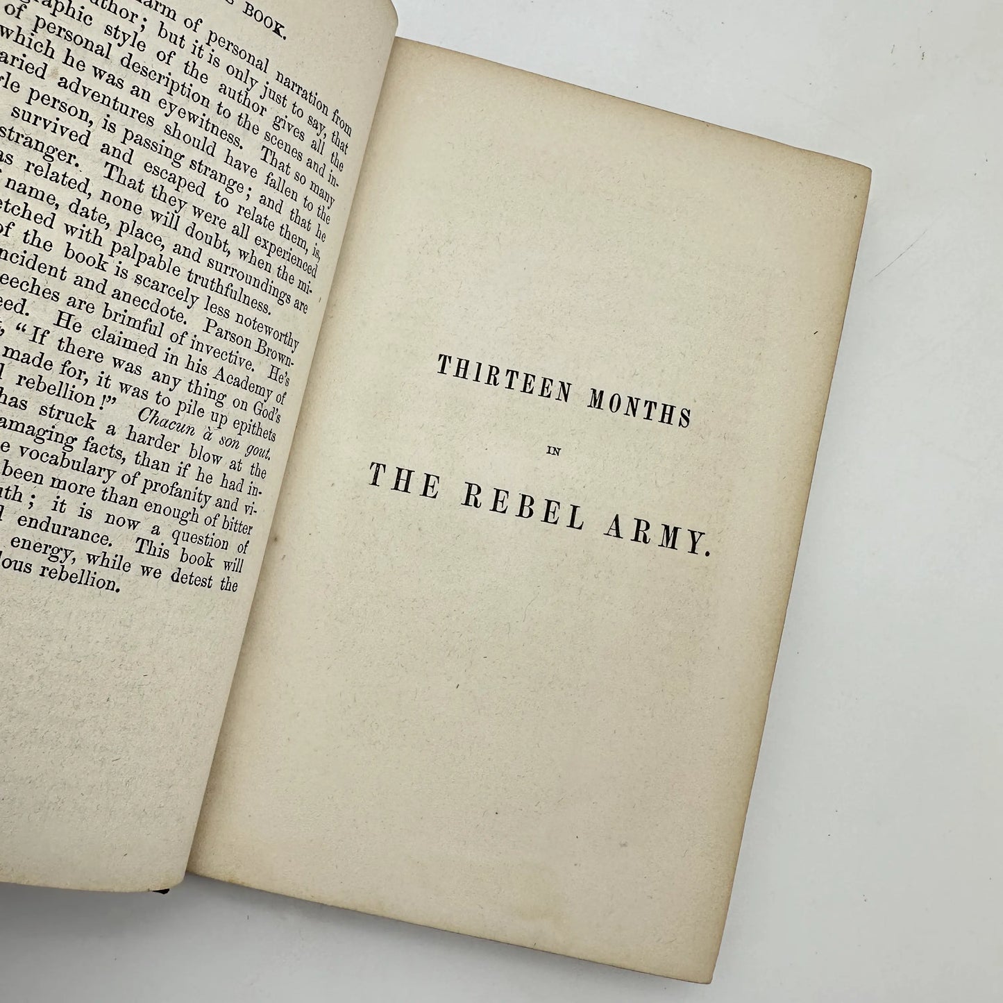 Books from the 1800s: Thirteen Months in the Rebel Army (1862), White Slavery in the Barbary States (1853), and Daniel Boone (1833)