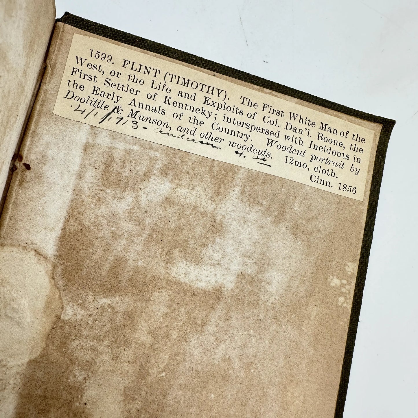 Books from the 1800s: Thirteen Months in the Rebel Army (1862), White Slavery in the Barbary States (1853), and Daniel Boone (1833)