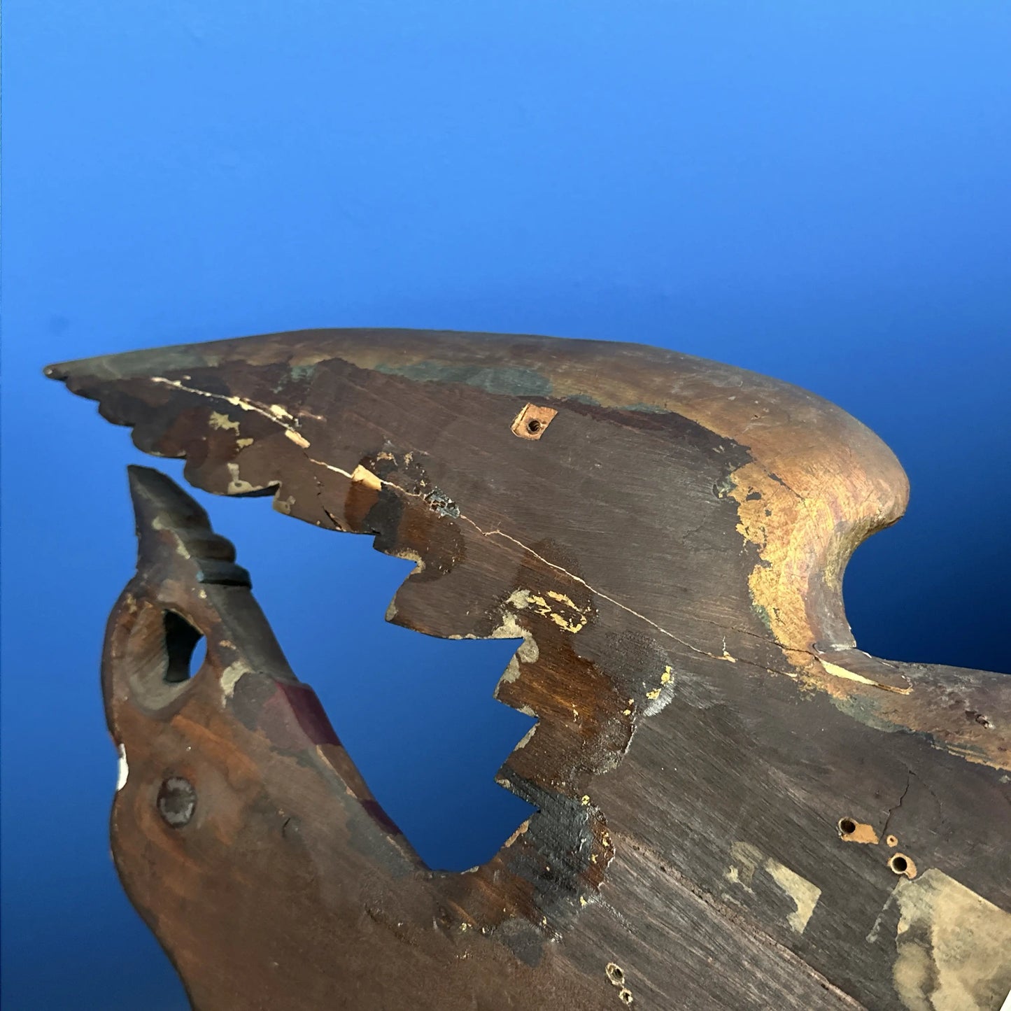 Carved wooden eagle with a shield and two flags — 29” wide