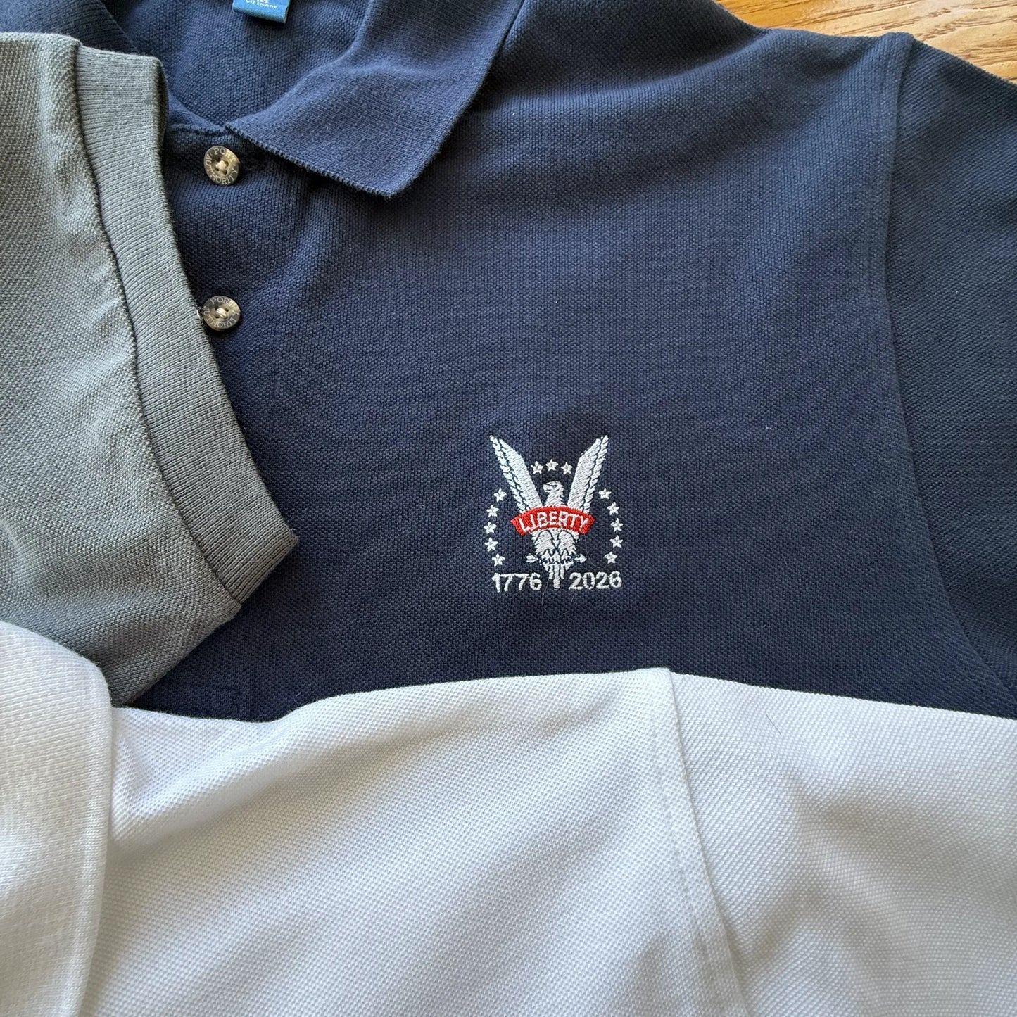 Embroidered Liberty Eagle 1776 - 2026 100% cotton pique polo shirt