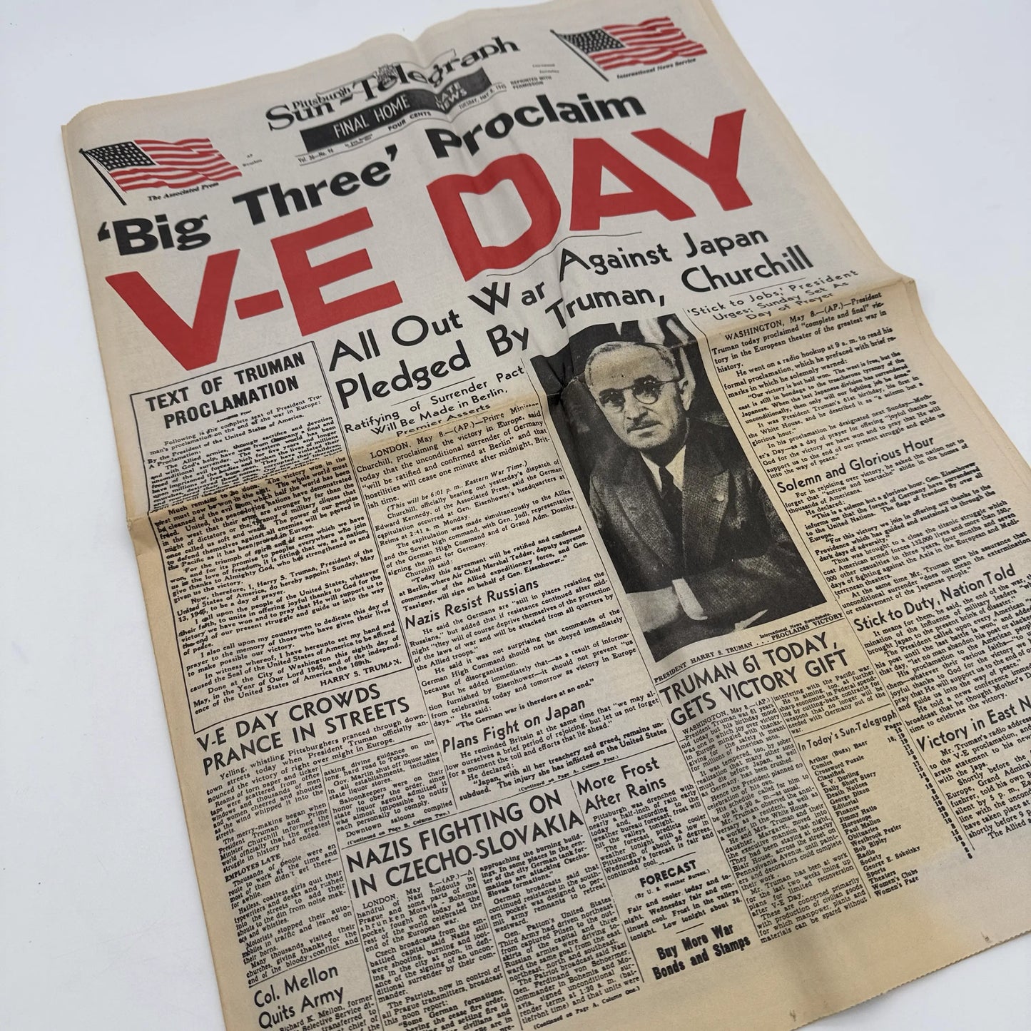 Three WWII newspapers —War Declared, V-E Day, Peace