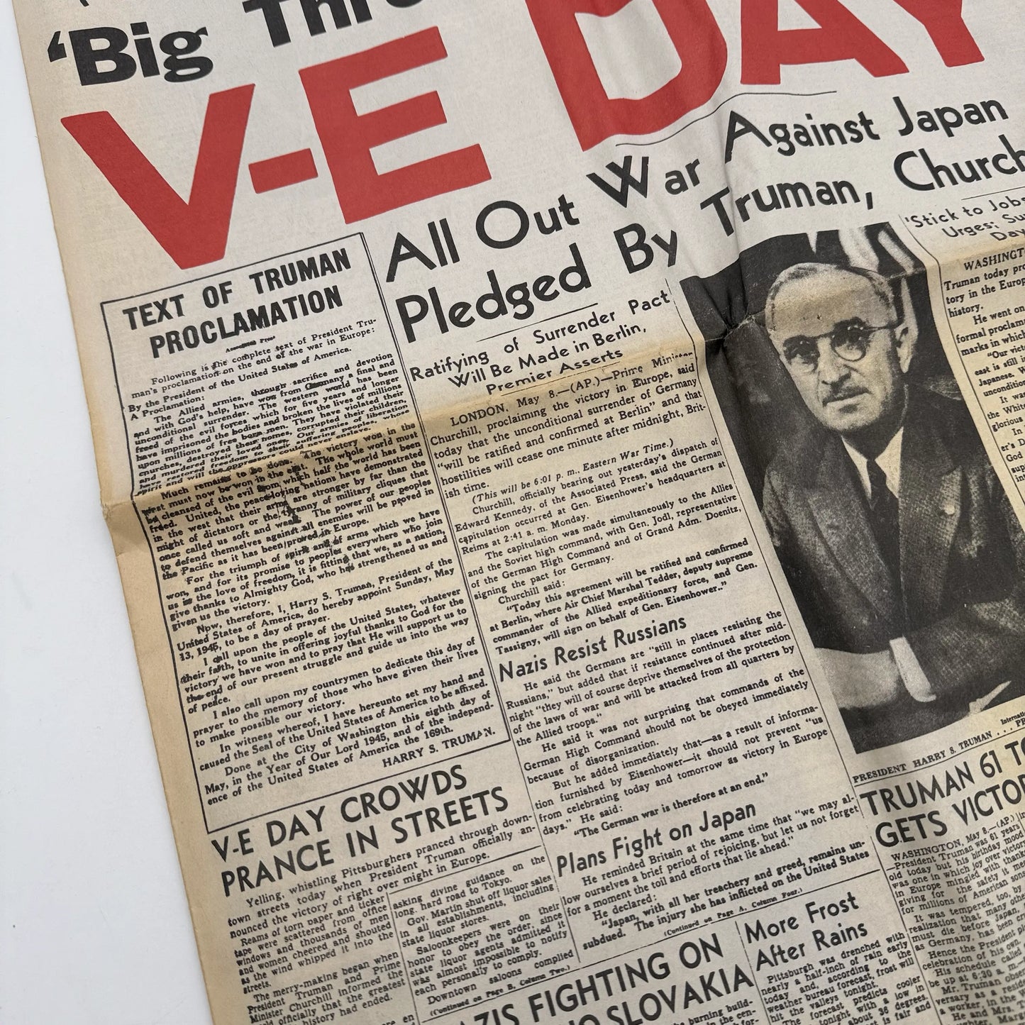 Three WWII newspapers —War Declared, V-E Day, Peace