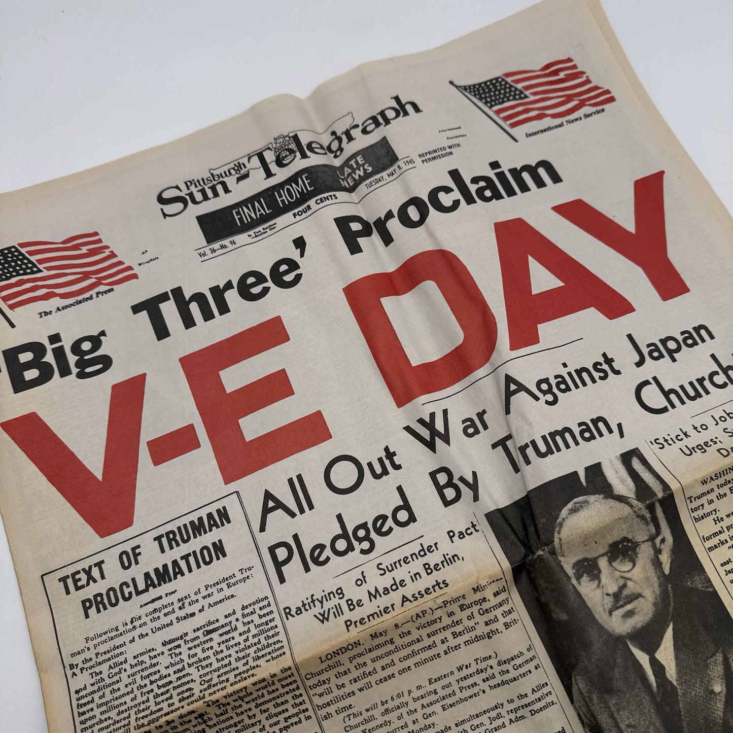 Three WWII newspapers —War Declared, V-E Day, Peace