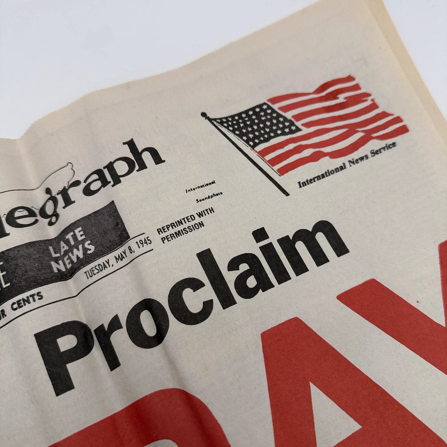 Three WWII newspapers —War Declared, V-E Day, Peace