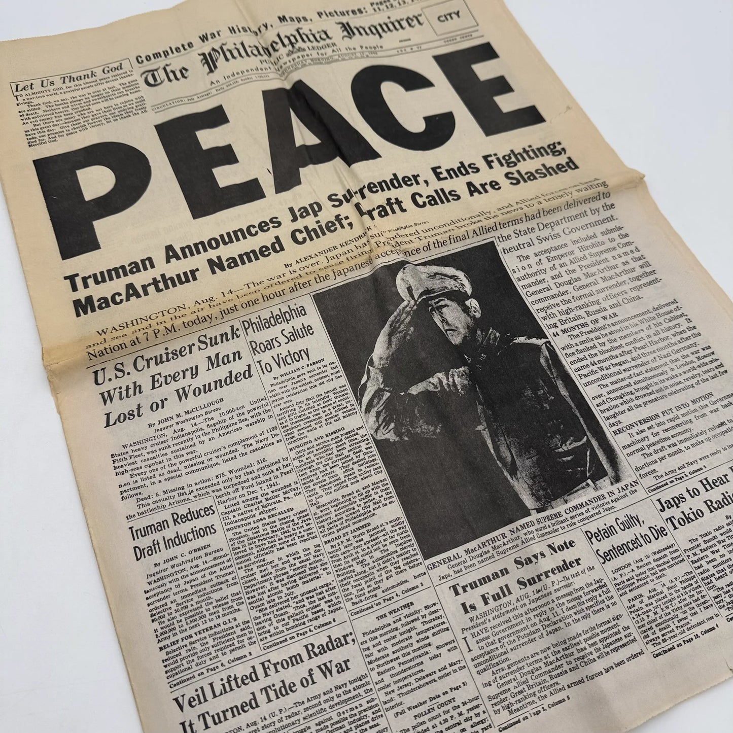 Three WWII newspapers —War Declared, V-E Day, Peace
