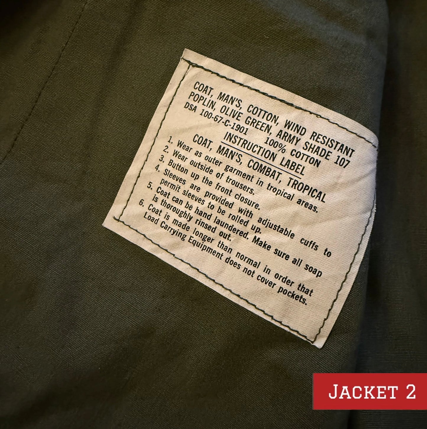 Army coats with D-Day patch and 48-star flag — One left