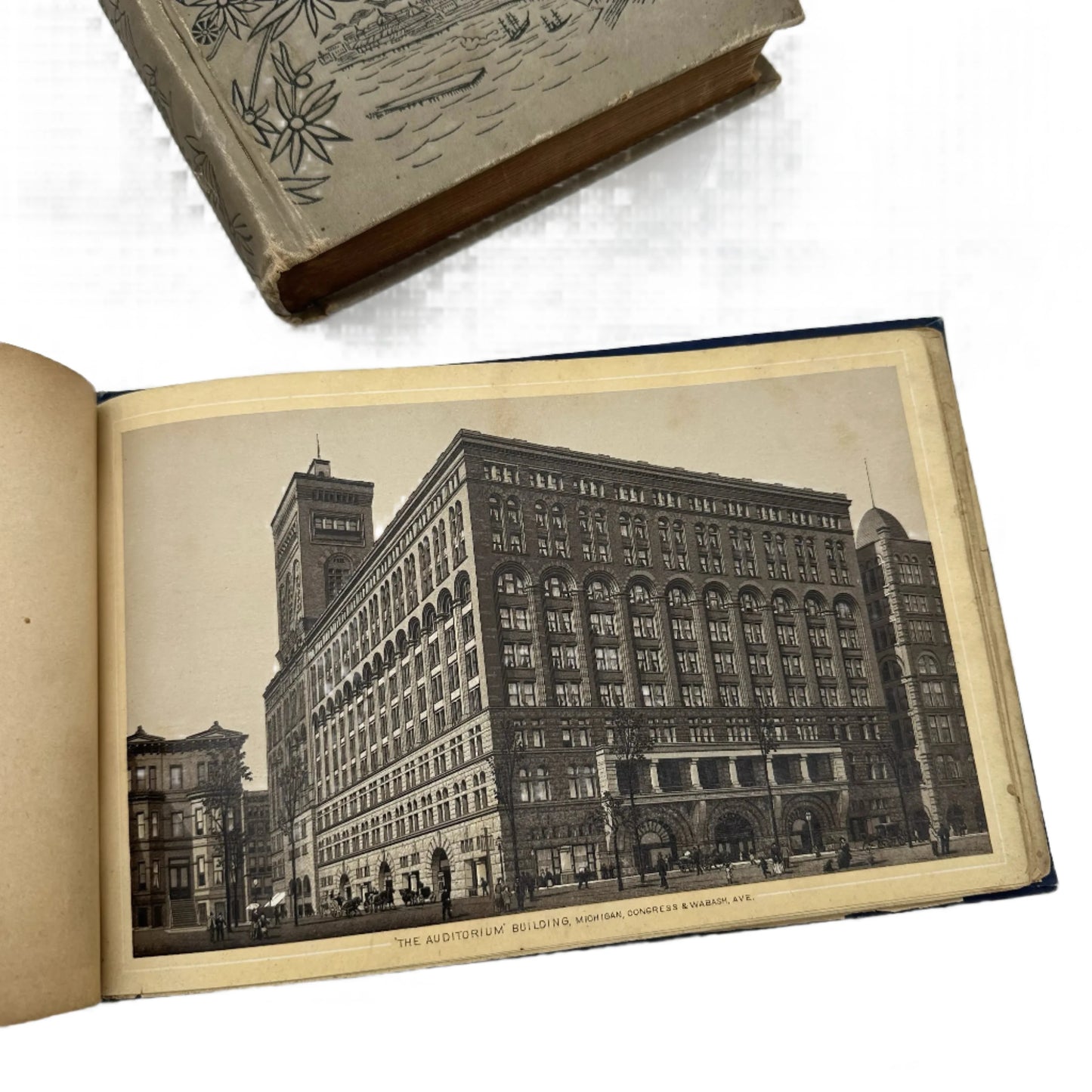 1893 "Artistic Guide to Chicago and the World's Columbian Exposition" with smaller blue book with images of Chicago