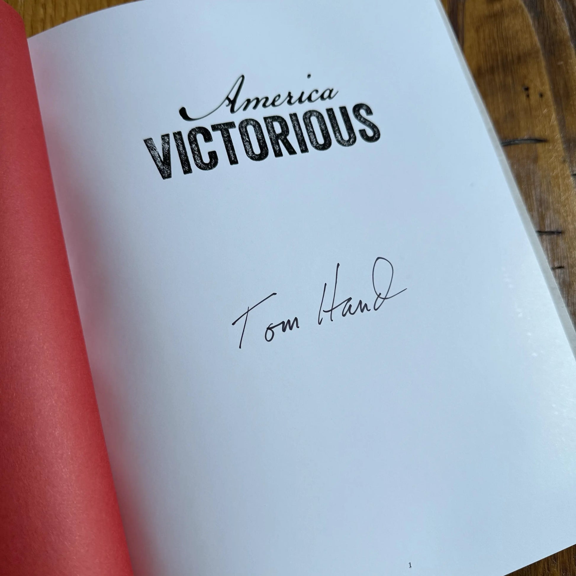 Title page of "America Victorious" — Signed by author, Tom Hand from The History List store