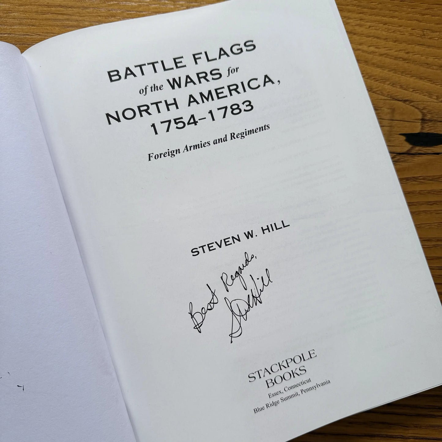 Signed title page of Battle Flags of the Wars for North America by Steven Hill from The History List store
