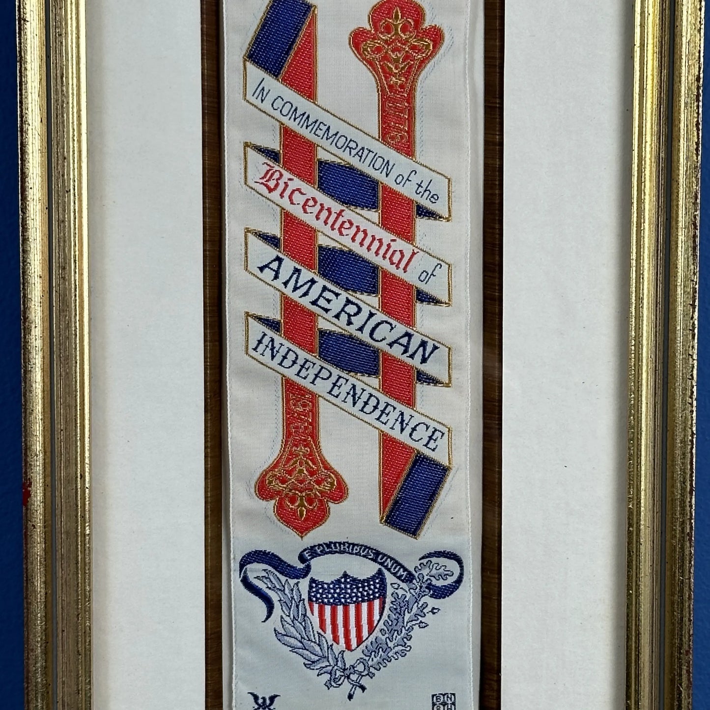 Close-up view of the text 'In Commemoration of the Bicentennial of American Independence' on the George Washington Bicentennial Silk Stevengraph Ribbon — framed, from The History List Store.