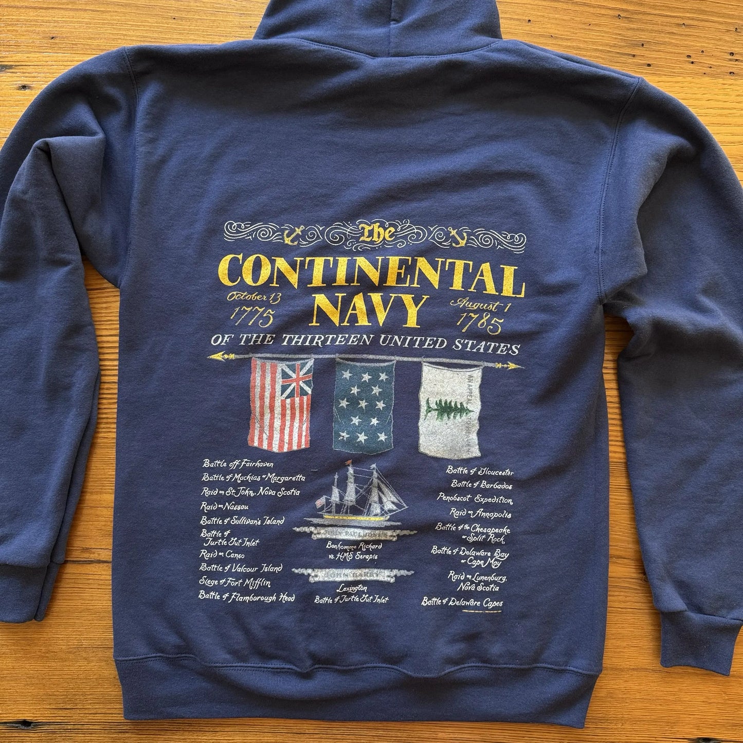 Back of The Continental Navy Hooded Sweatshirt from The History List Store