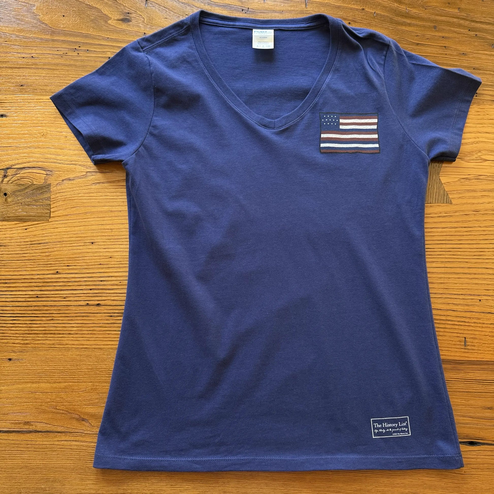 Front of Back of The Continental Navy v-neck shirt from The History List Store