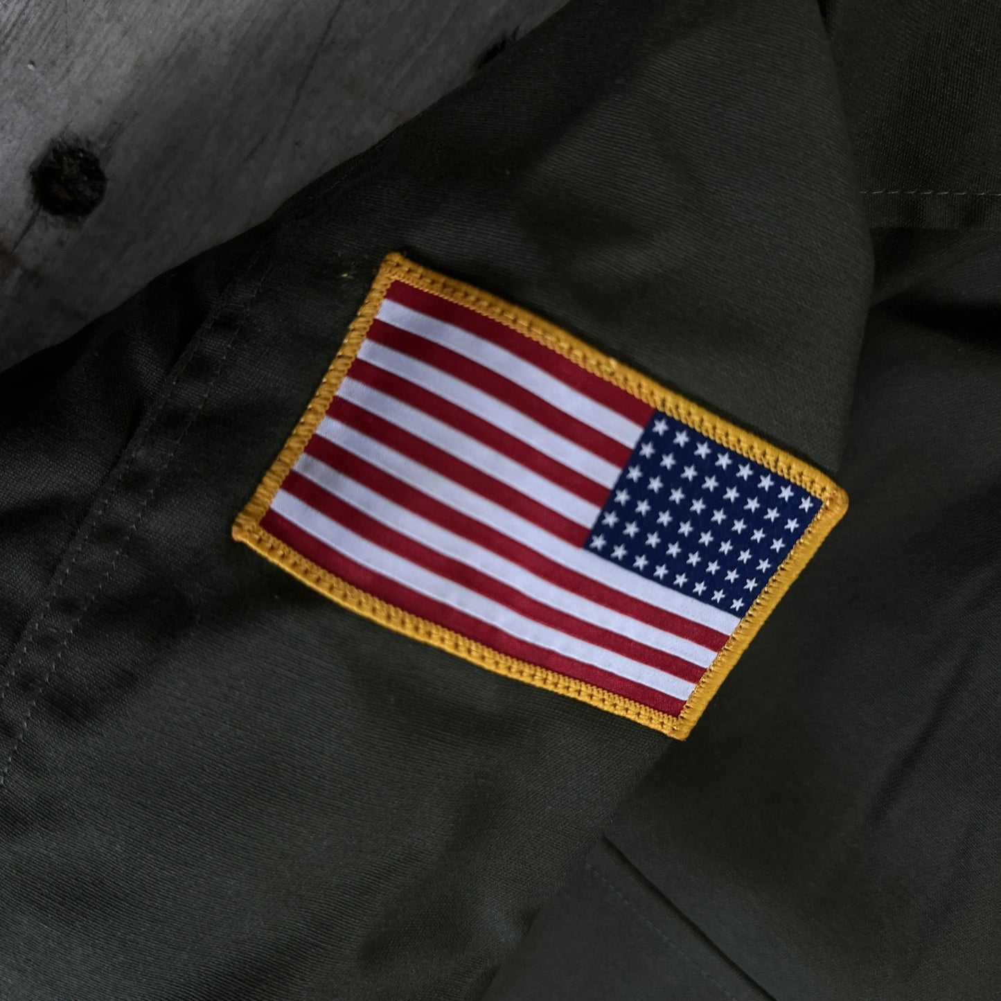 M65 Army field coats with original D-Day 80th Anniversary design and a 48-star flag