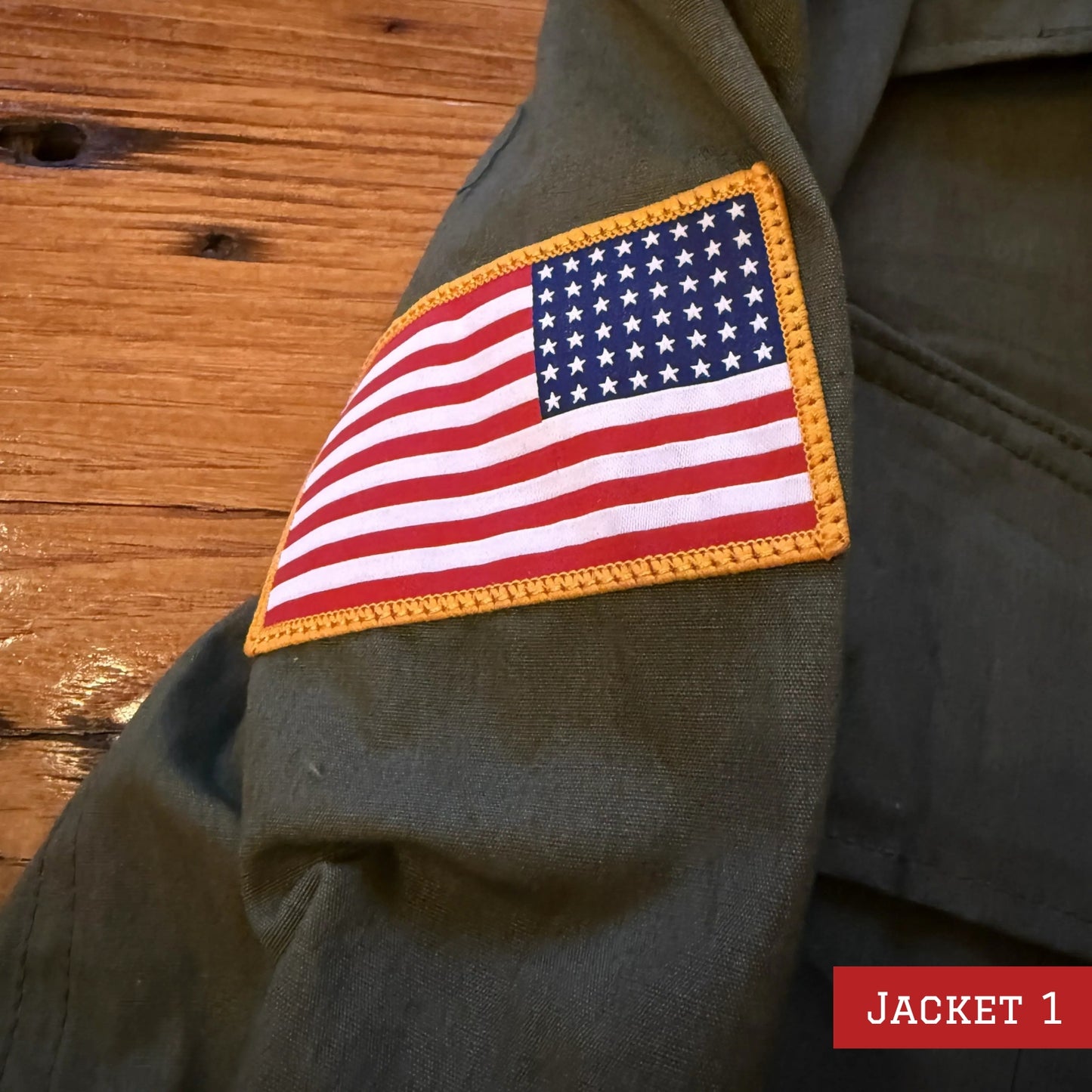 Army coats with D-Day patch and 48-star flag — One left