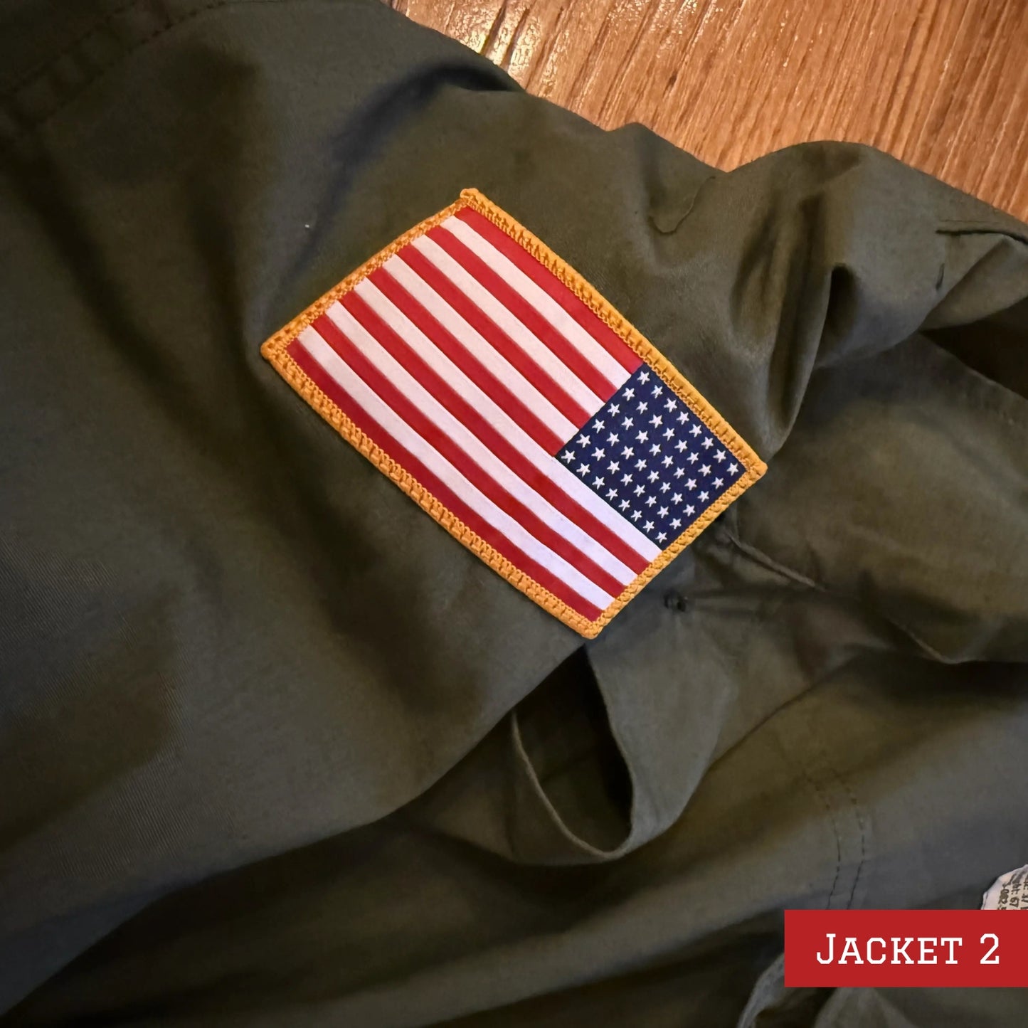 Army coats with D-Day patch and 48-star flag — One left