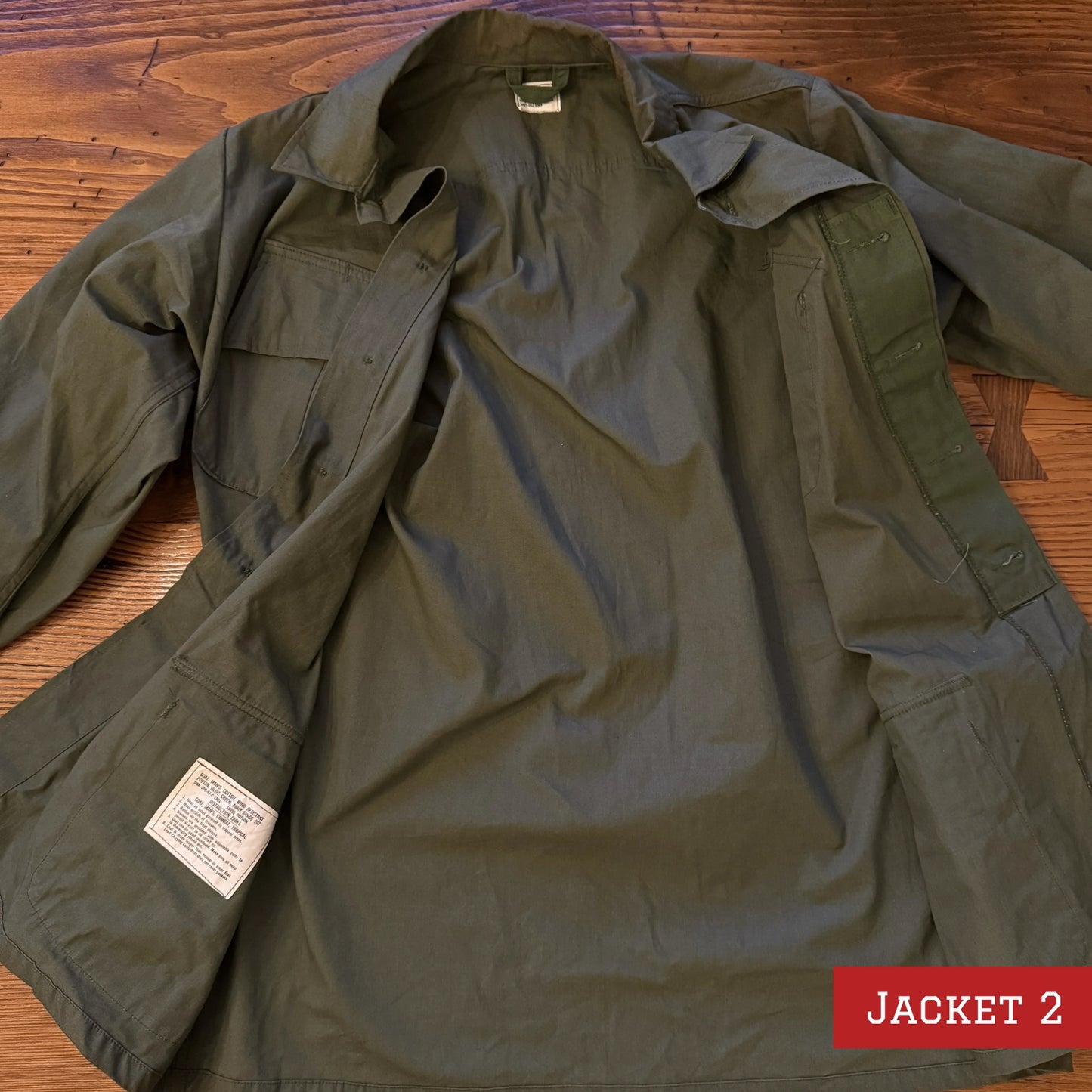 Army coats with D-Day patch and 48-star flag — One left